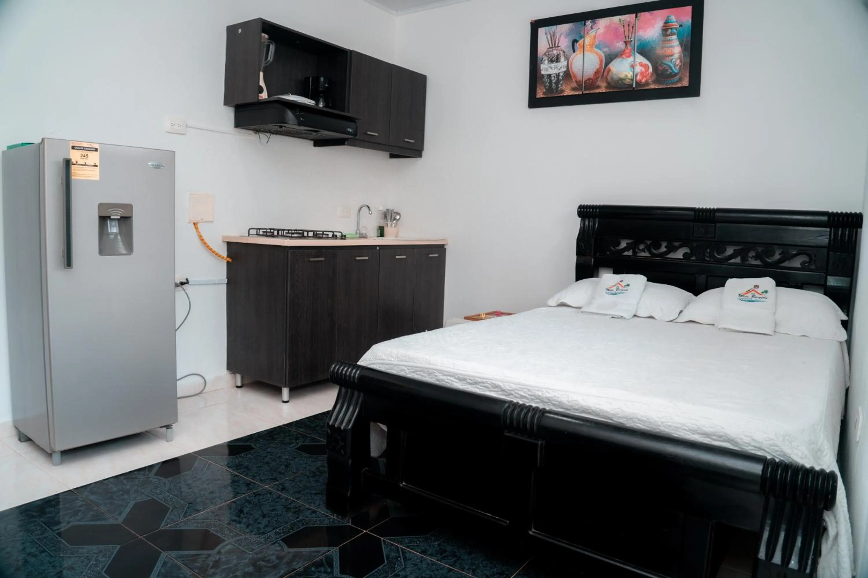 Kitchen or kitchenette, Bed in Apartamento Miss Brigida