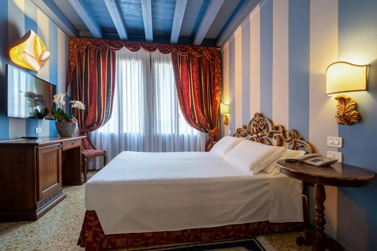 Bed in Hotel Tiziano