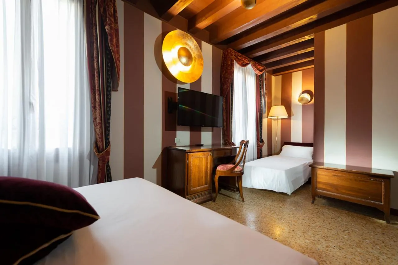 Bed in Hotel Tiziano