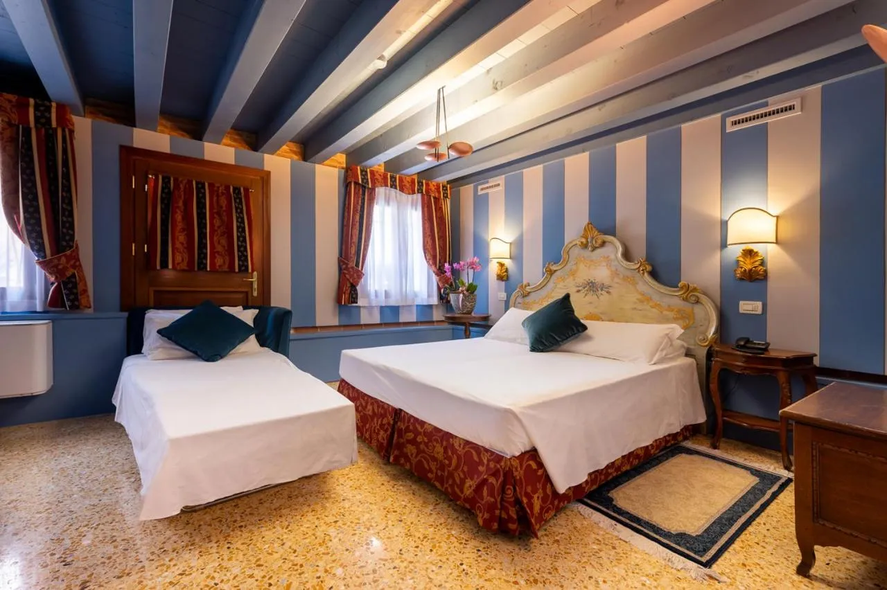 Bed in Hotel Tiziano