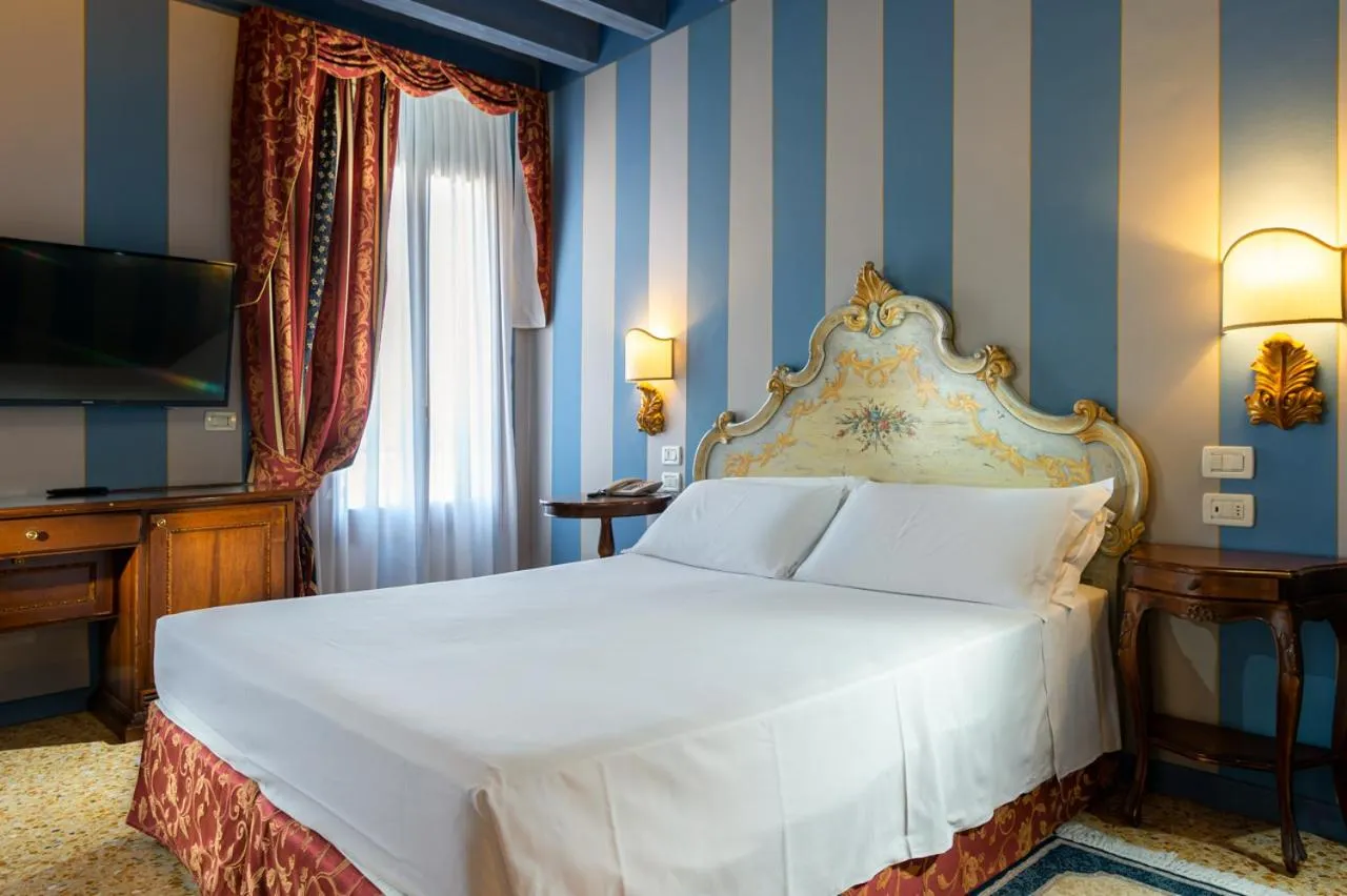 Bed in Hotel Tiziano