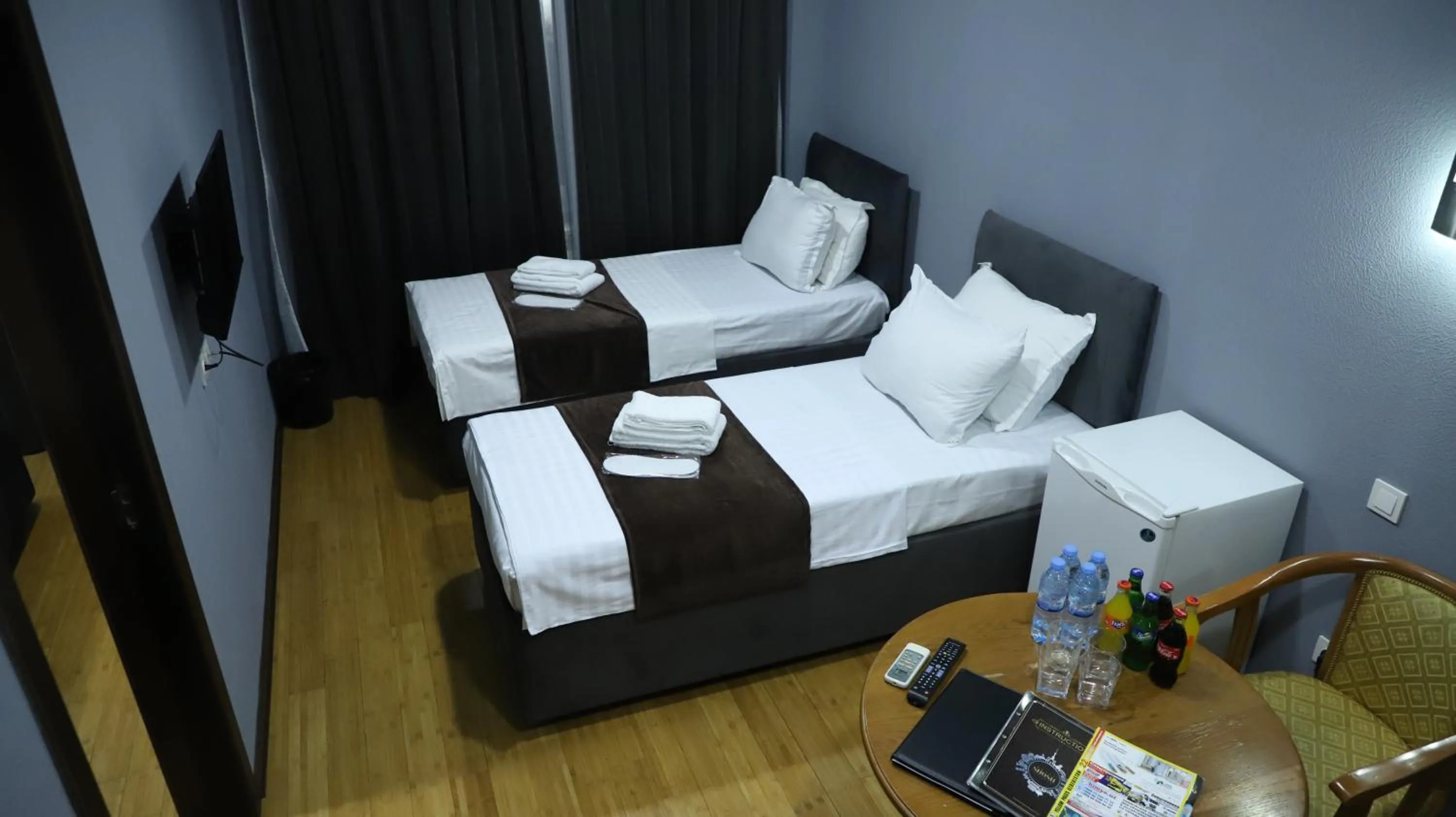 Bed in Grand Avenue Hotel