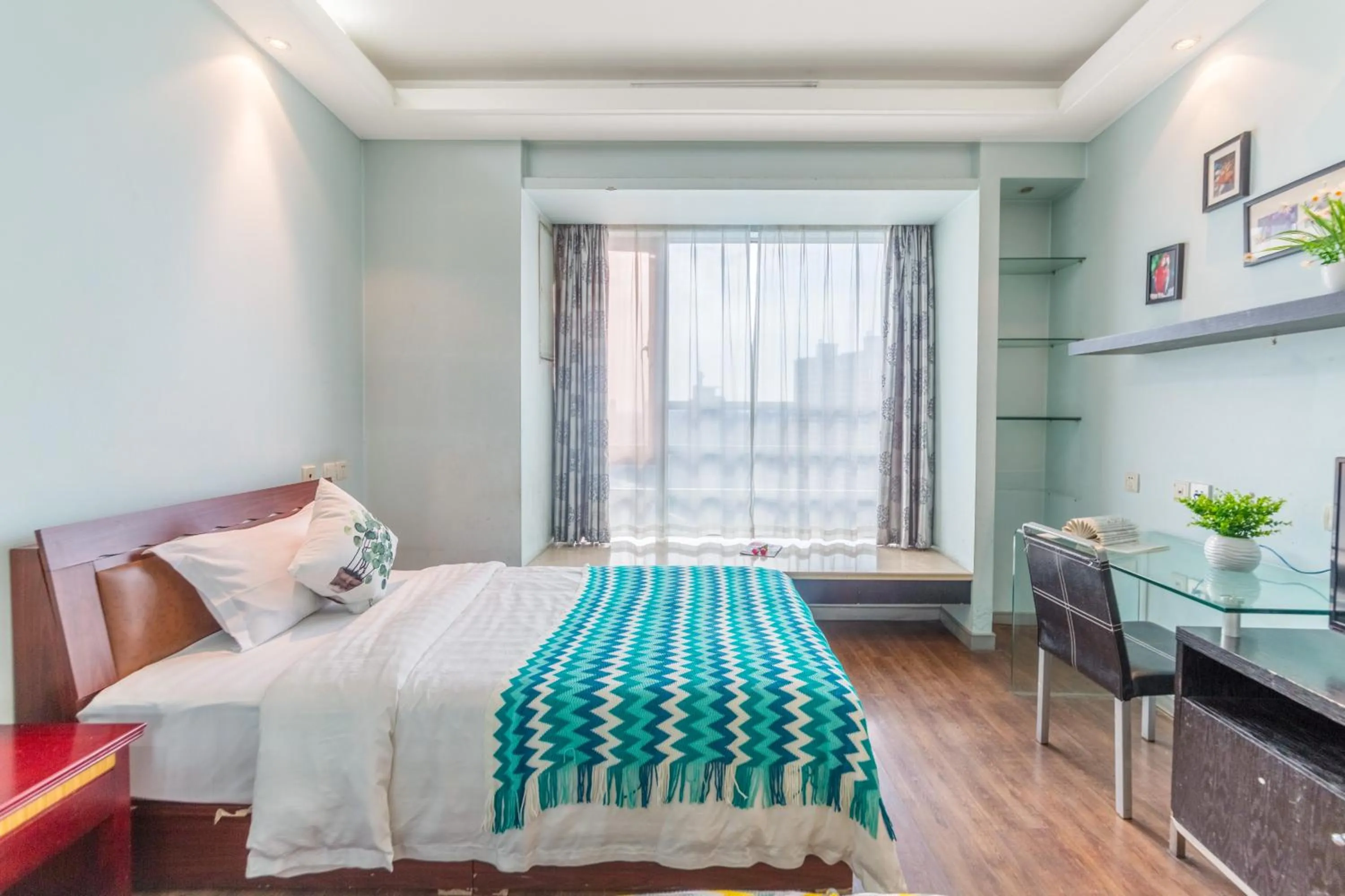 Bed in Shanghai Jiarong Hotel Apartment