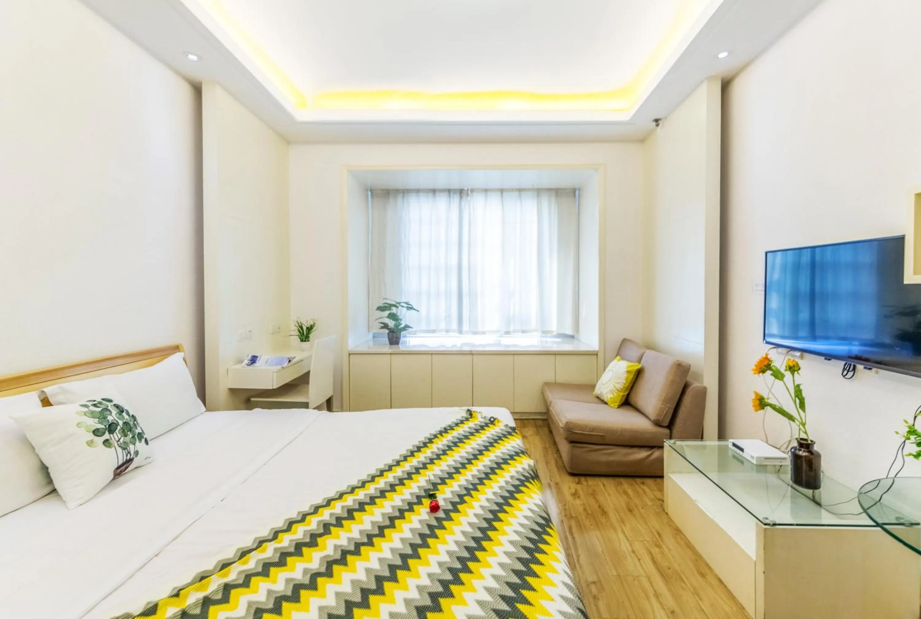 Bed in Shanghai Jiarong Hotel Apartment