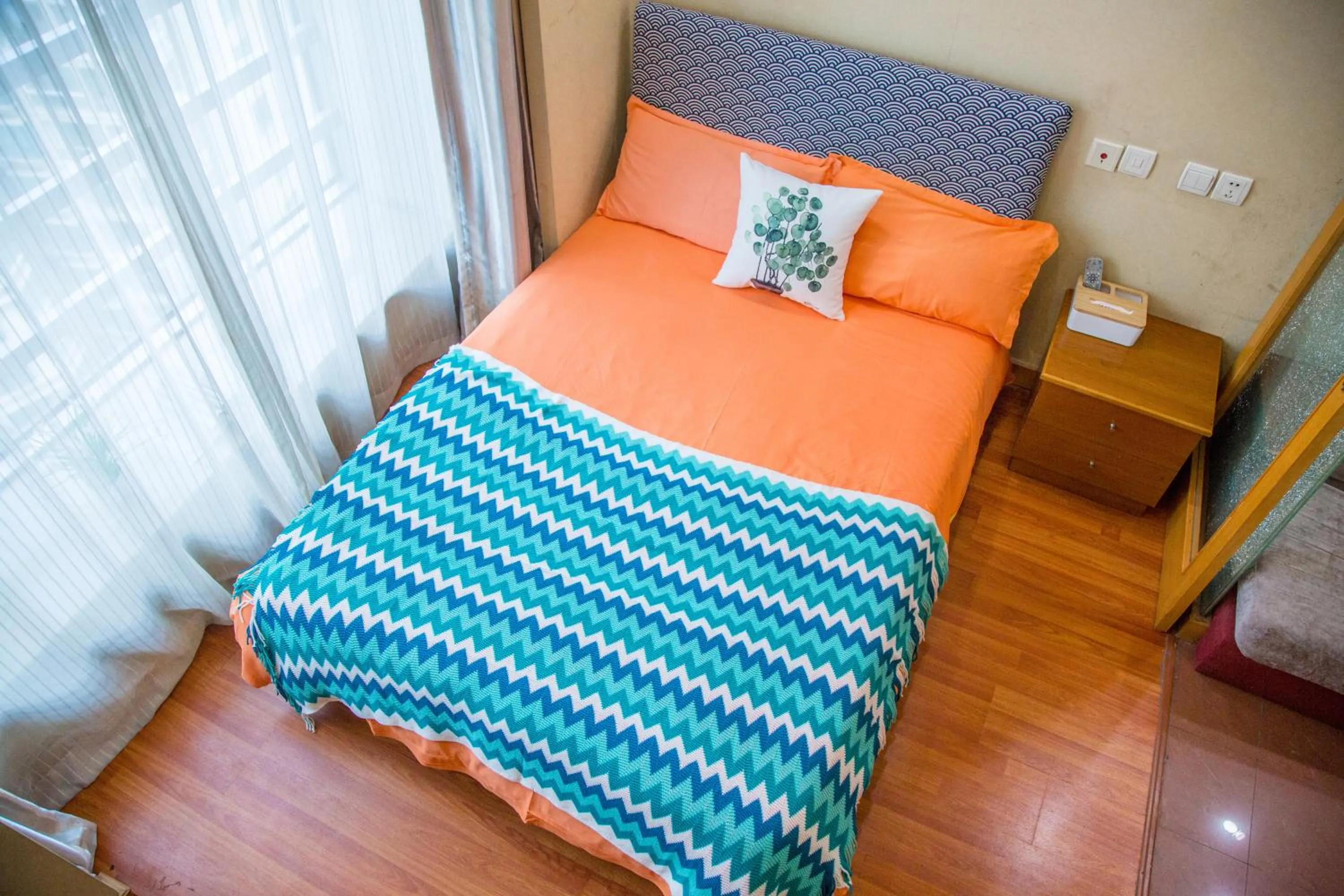 Bed in Shanghai Jiarong Hotel Apartment