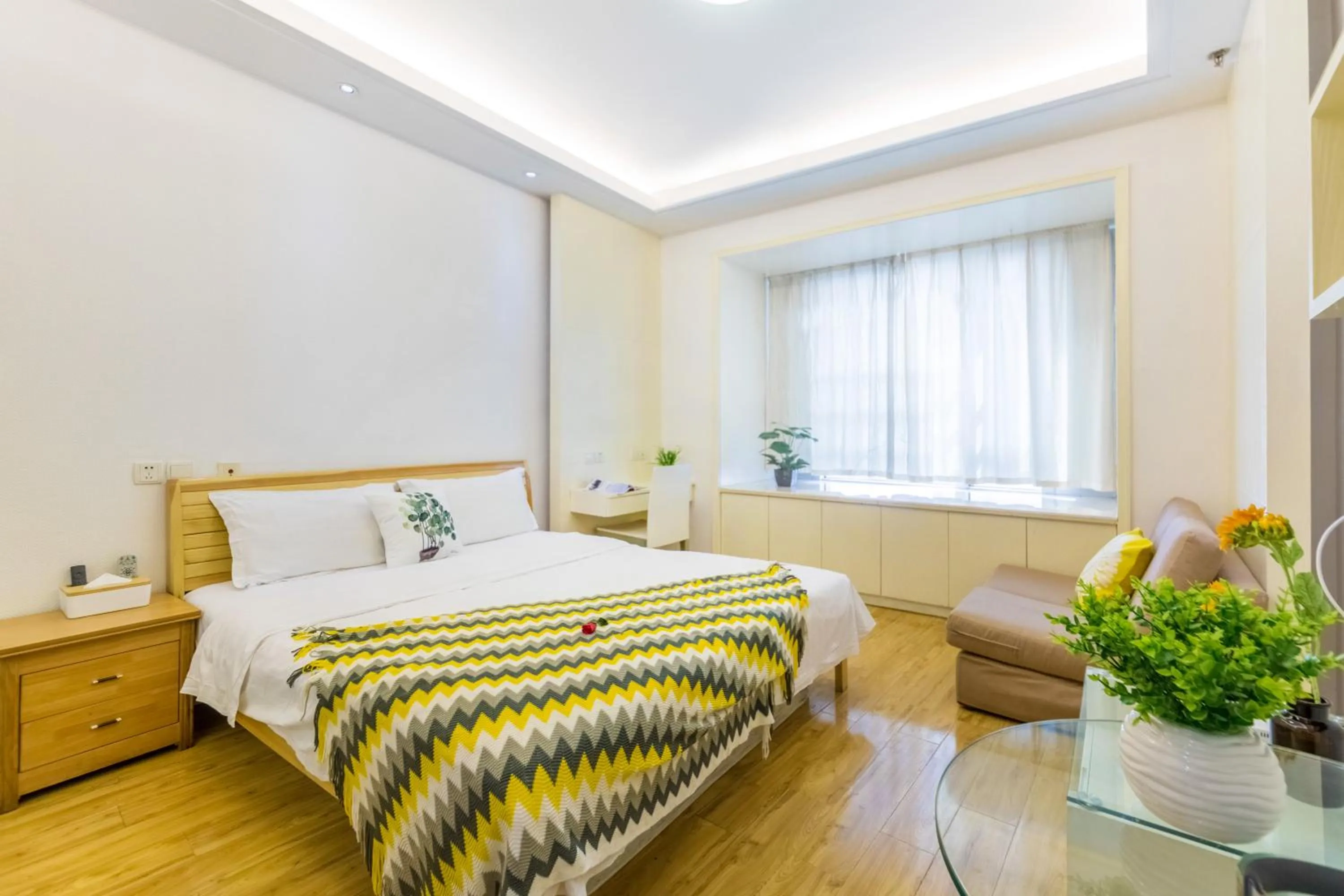 Bed in Shanghai Jiarong Hotel Apartment