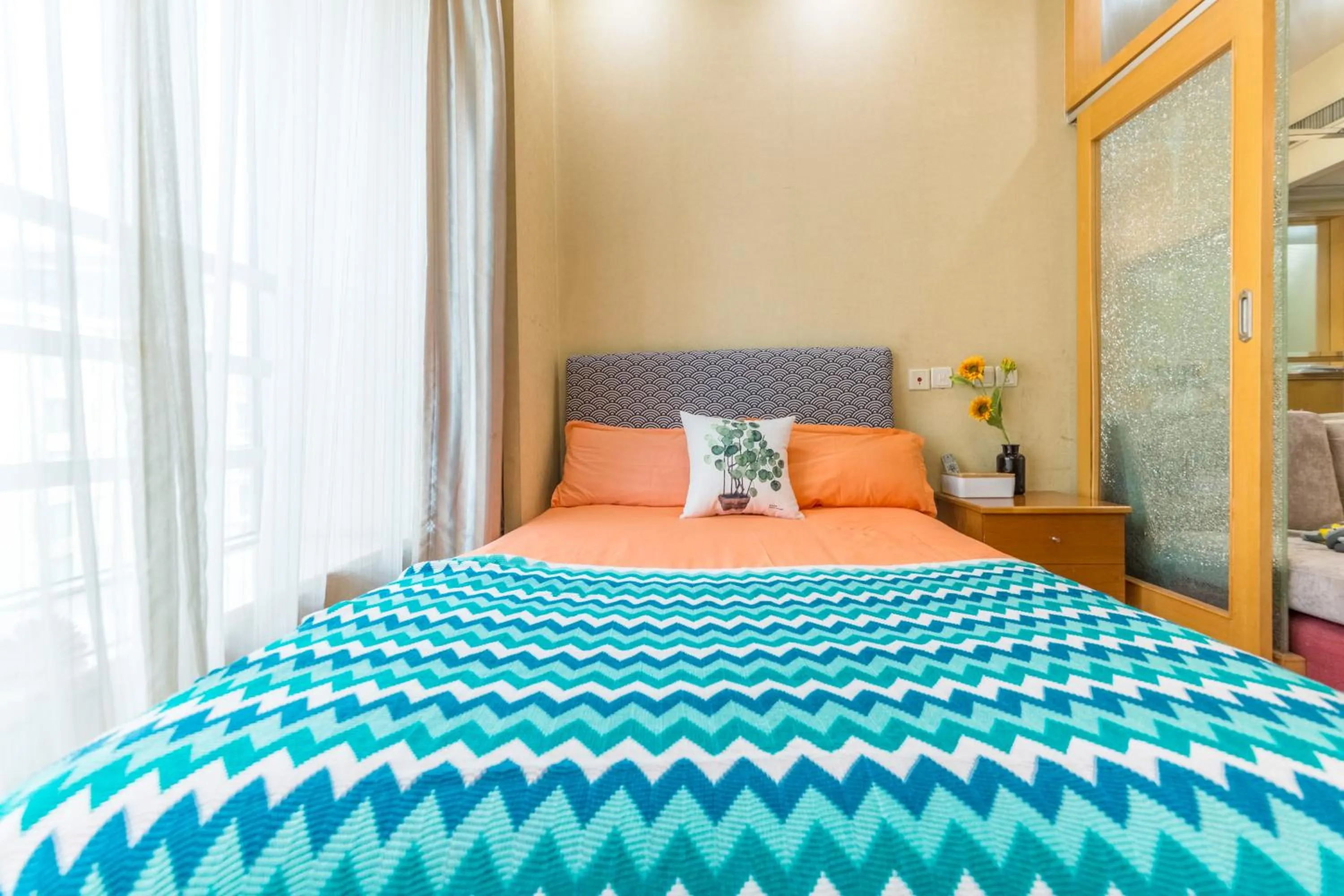 Bed in Shanghai Jiarong Hotel Apartment