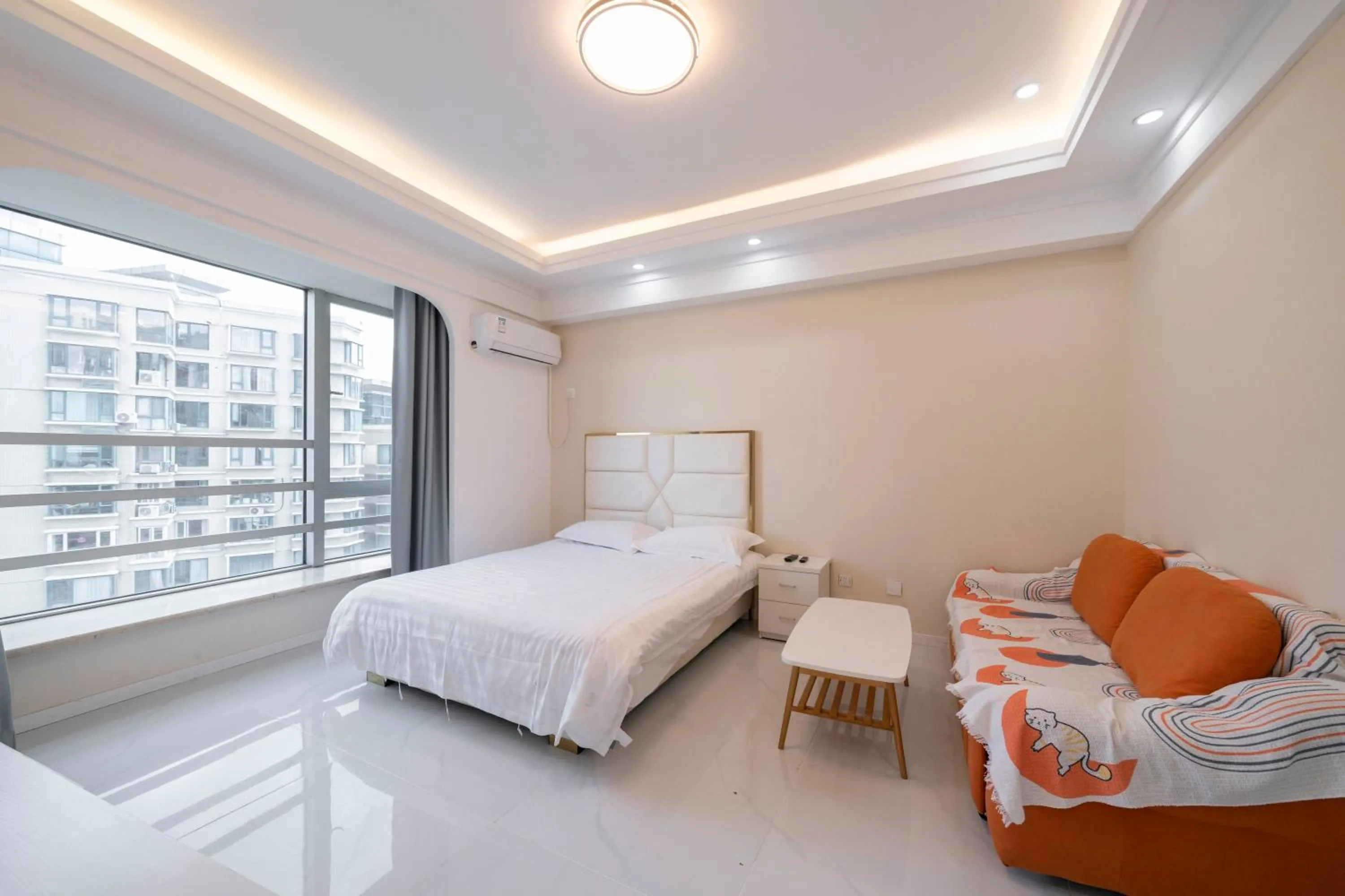 Bed in Shanghai Jiarong Hotel Apartment