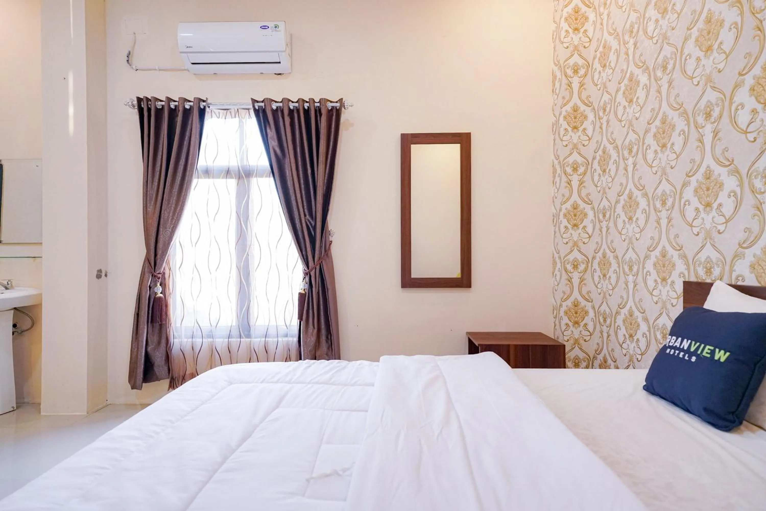 Bedroom, Bed in Urbanview Hotel St Faustina Lampung by RedDoorz