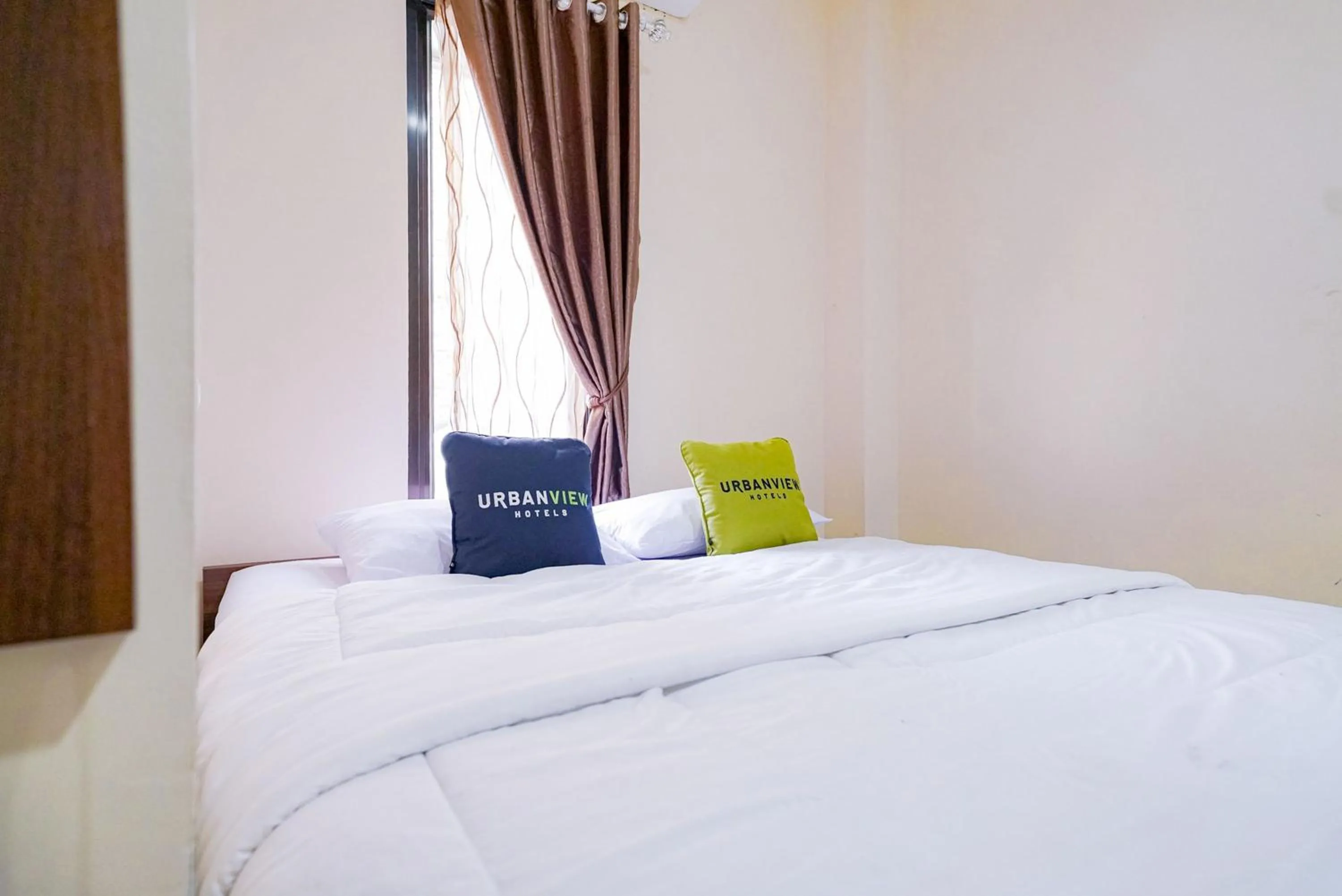 Bedroom, Bed in Urbanview Hotel St Faustina Lampung by RedDoorz