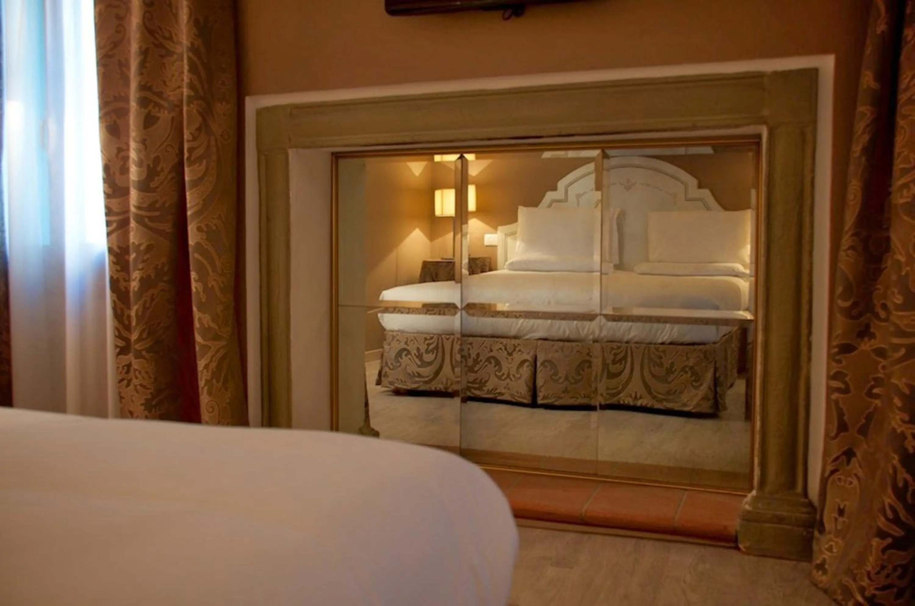 Decorative detail, Bed in Hotel Canon d'Oro