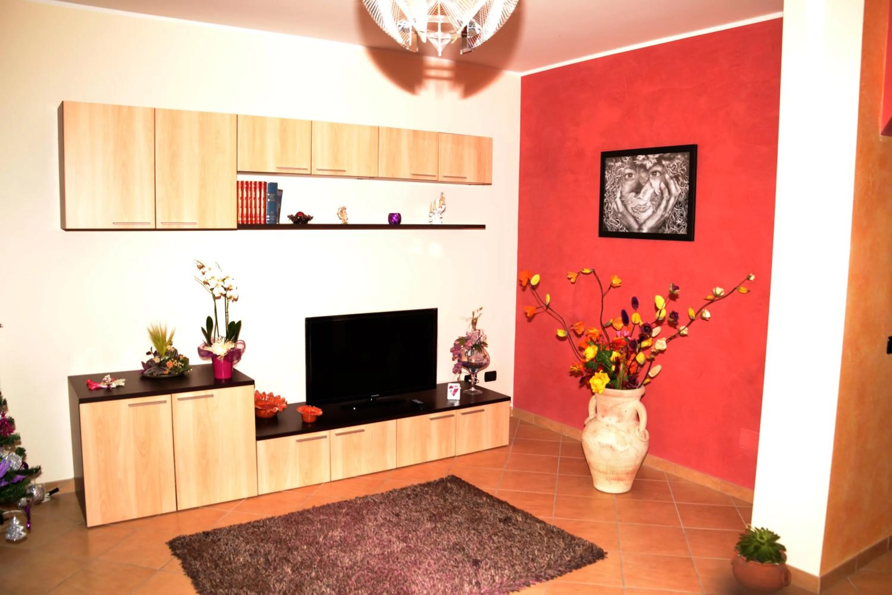 Communal lounge/ TV room in La Baia del Lago