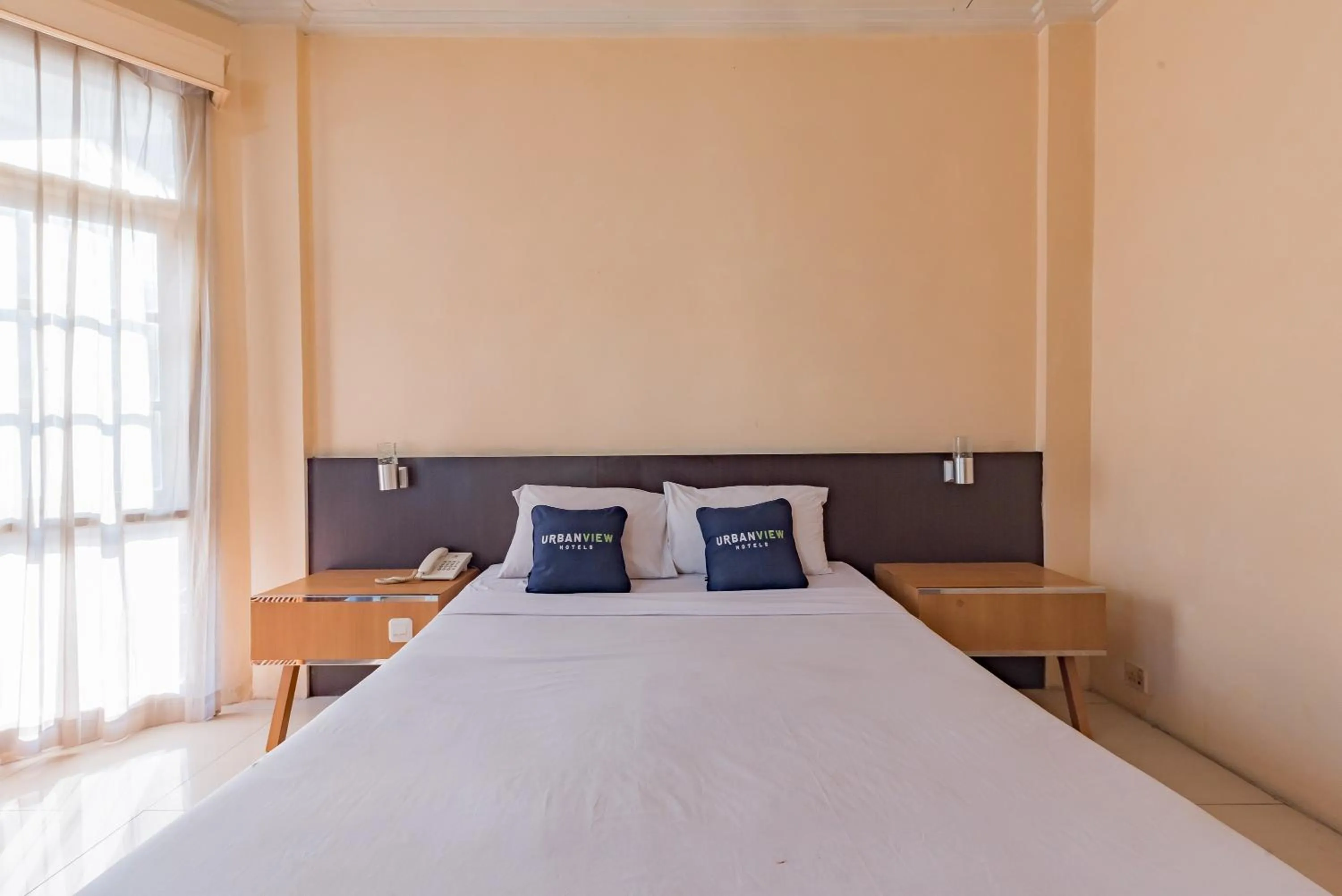 Bedroom, Bed in Urbanview Hotel Crown Tasikmalaya by RedDoorz