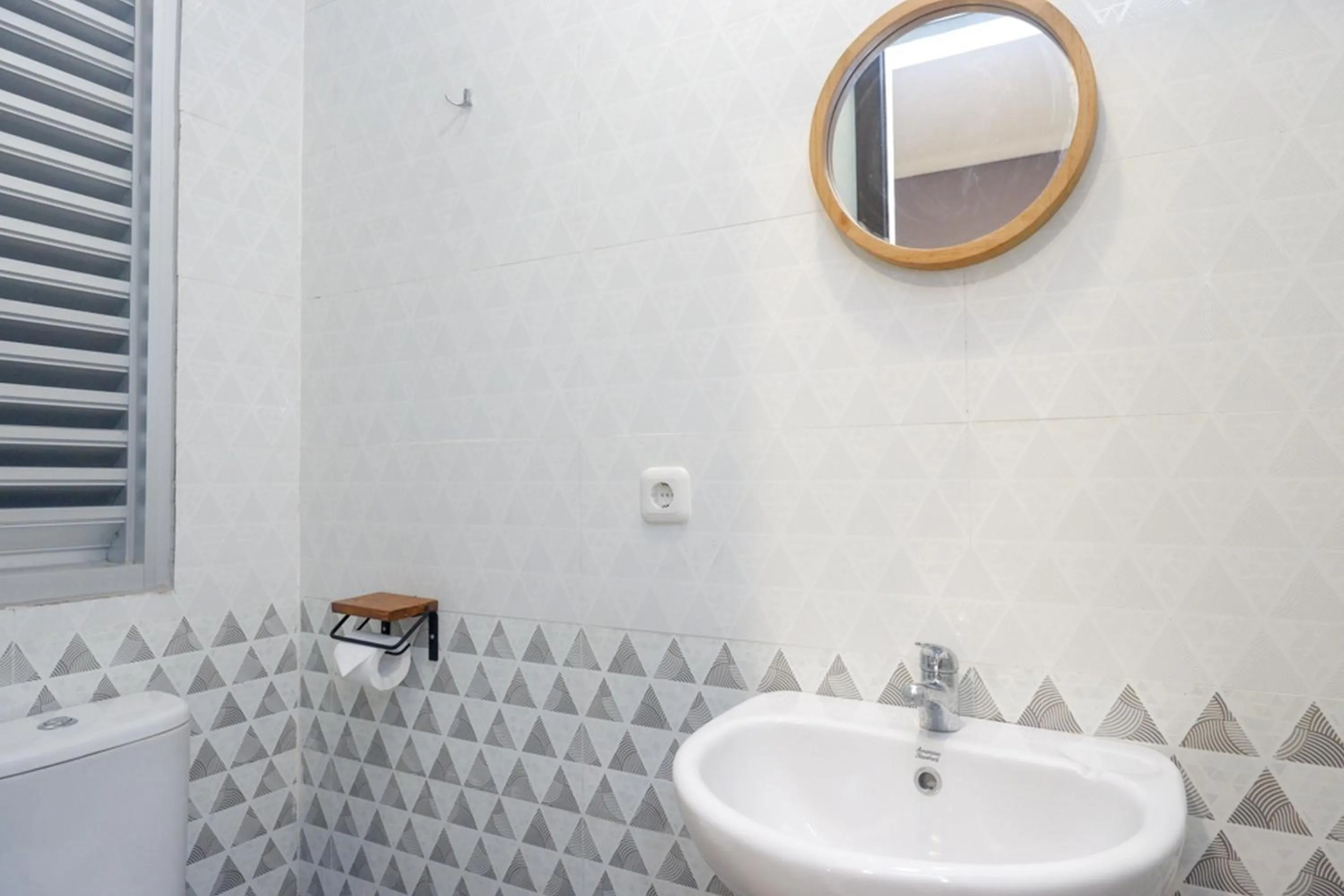 Bathroom in Sans Hotel Good Wish Semarang