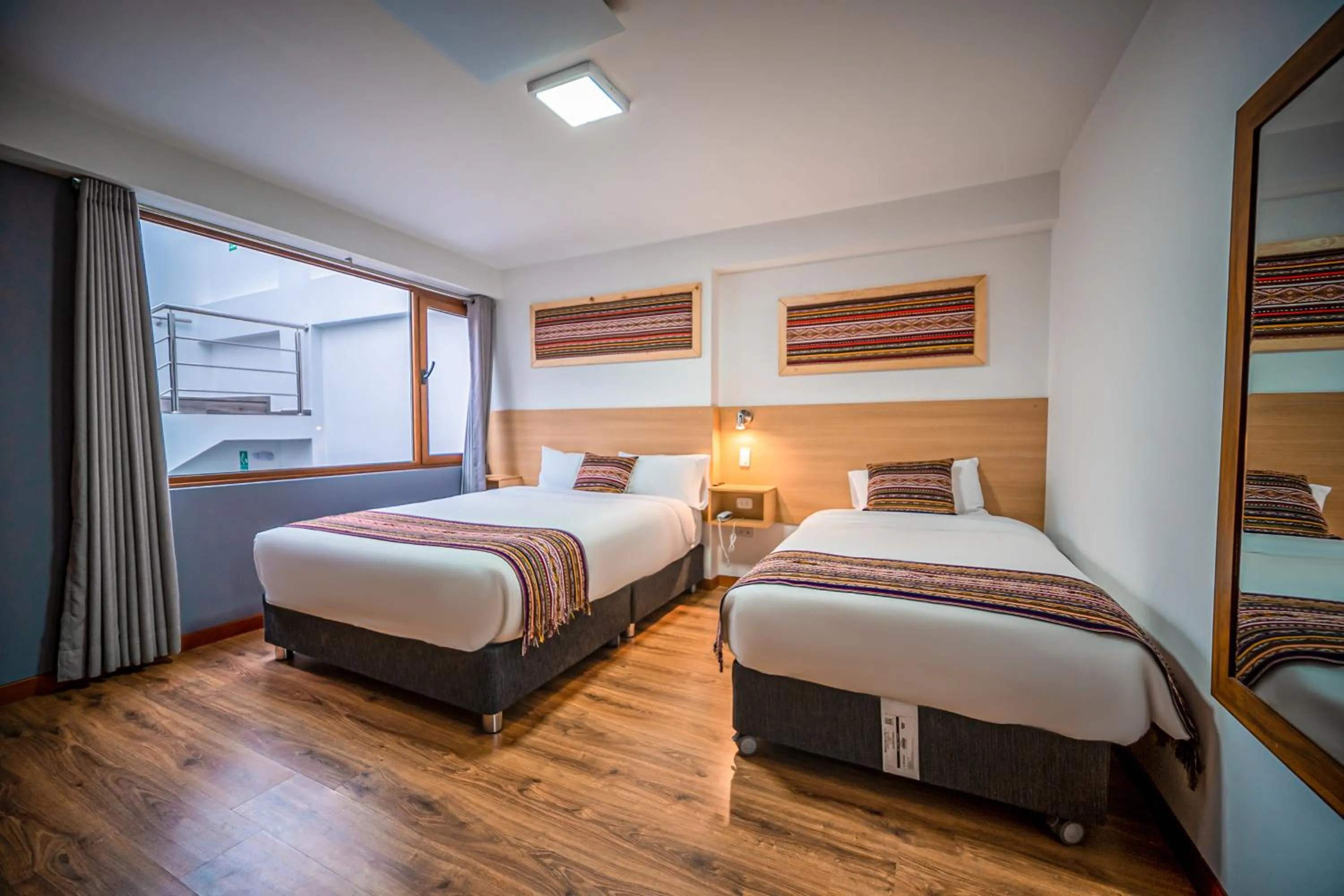 Bed in Ayni Cusco Hotel