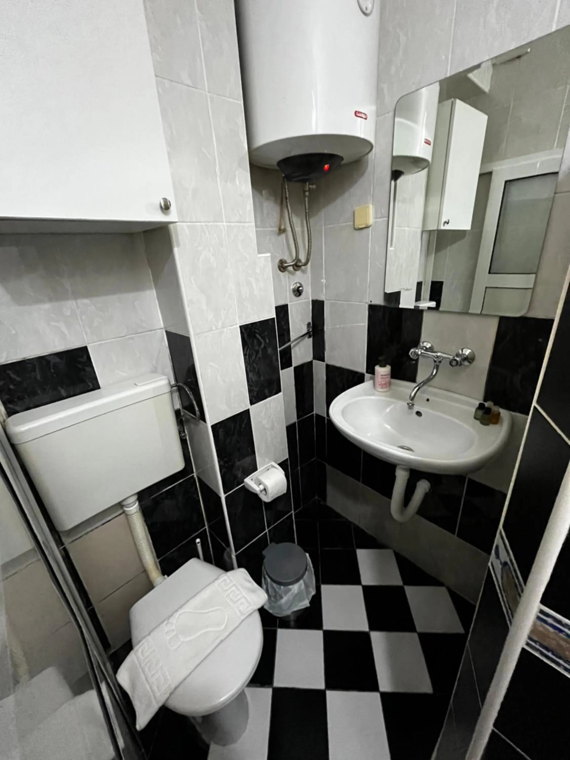 Bathroom in Puerta Apartments