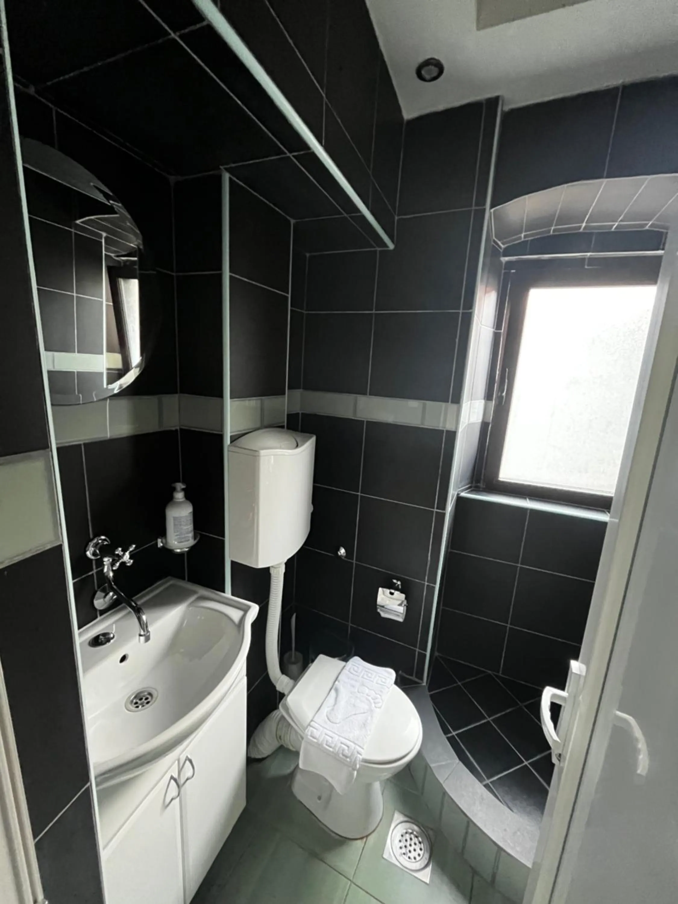 Bathroom in Puerta Apartments