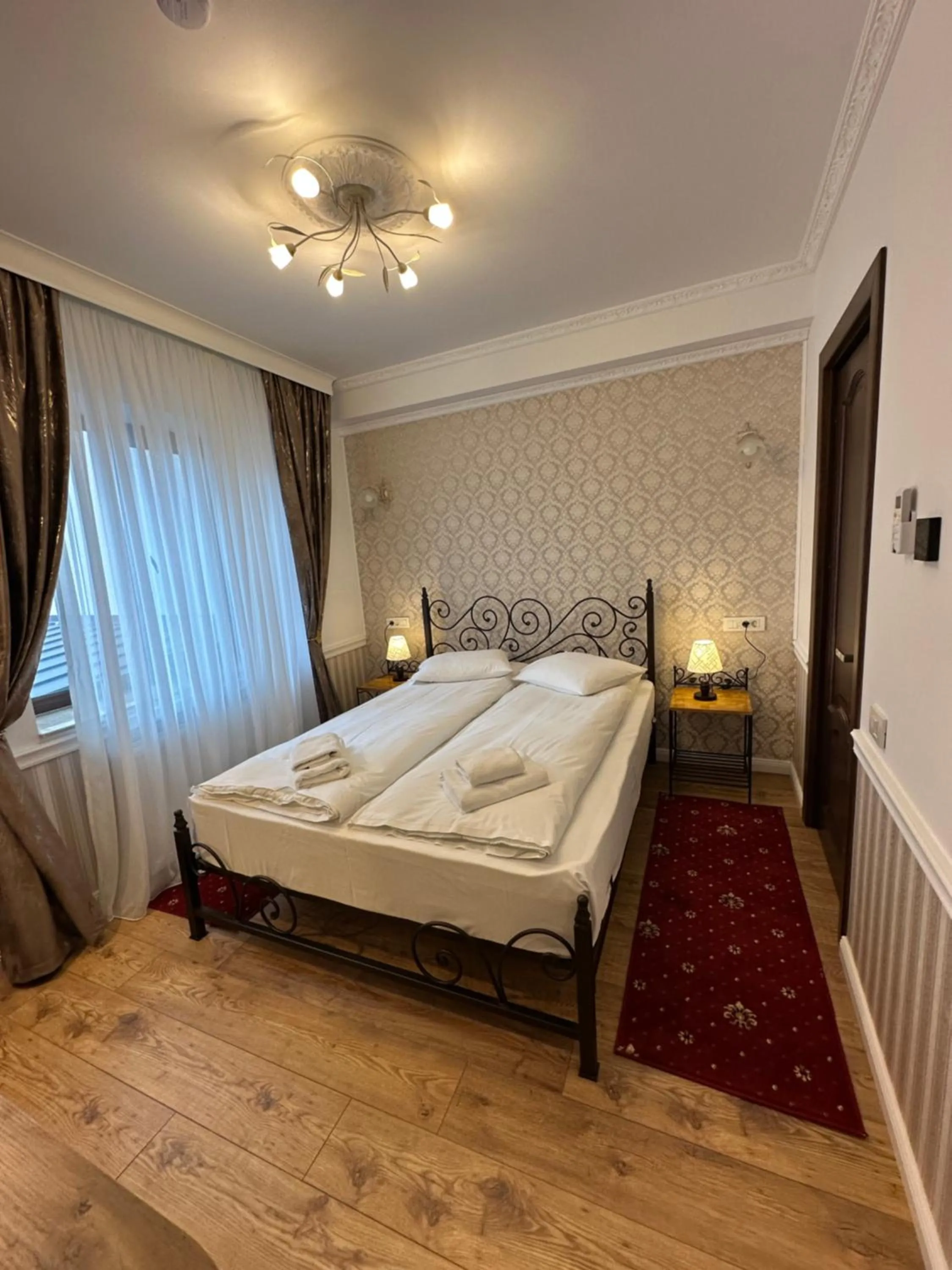 Bed in Hotel Boutique Cathedral Plaza Residences room for rent downtown