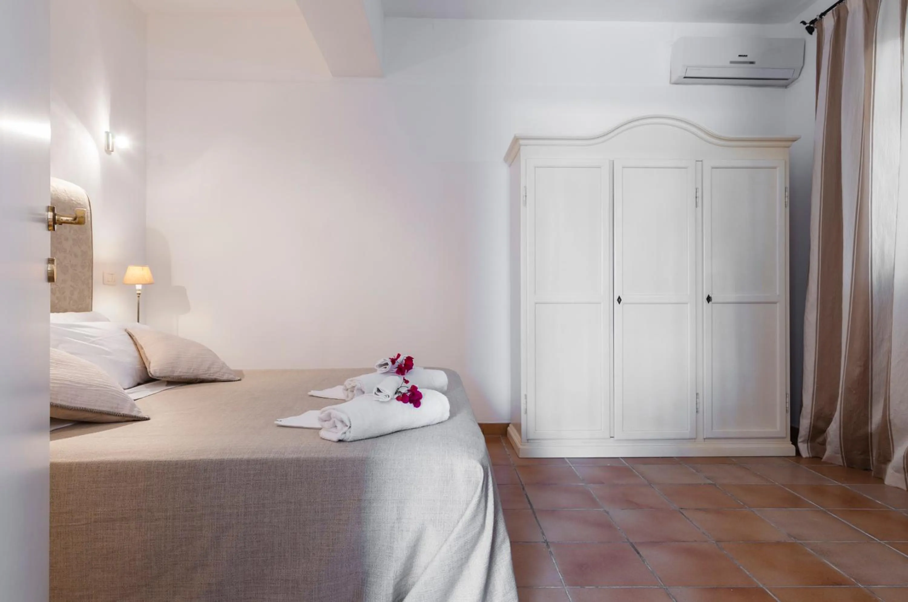 Bed in Stella del mare Apartments