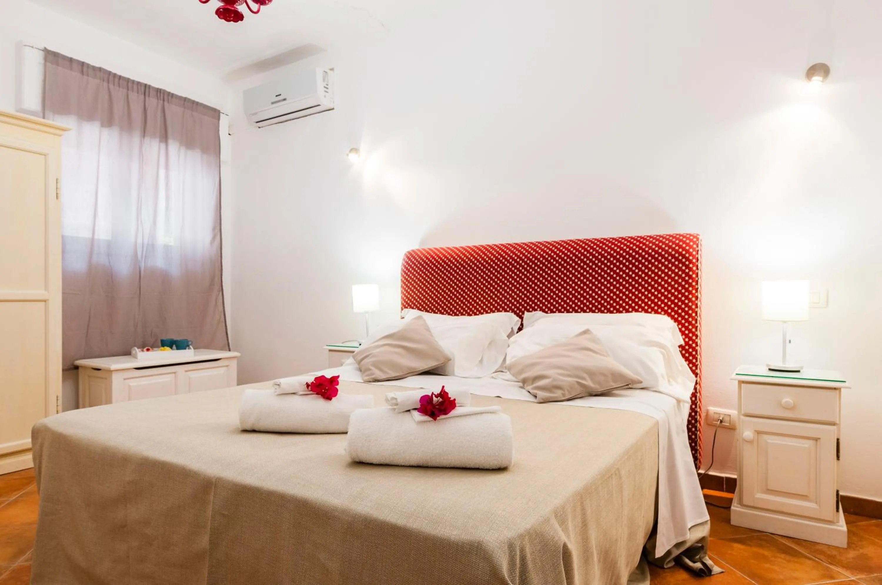 Bed in Stella del mare Apartments