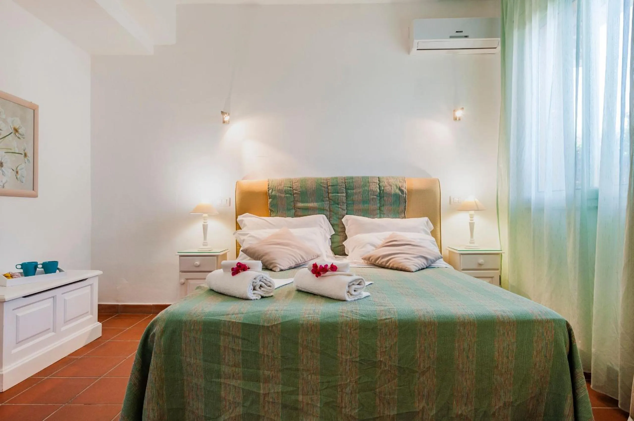Bed in Stella del mare Apartments