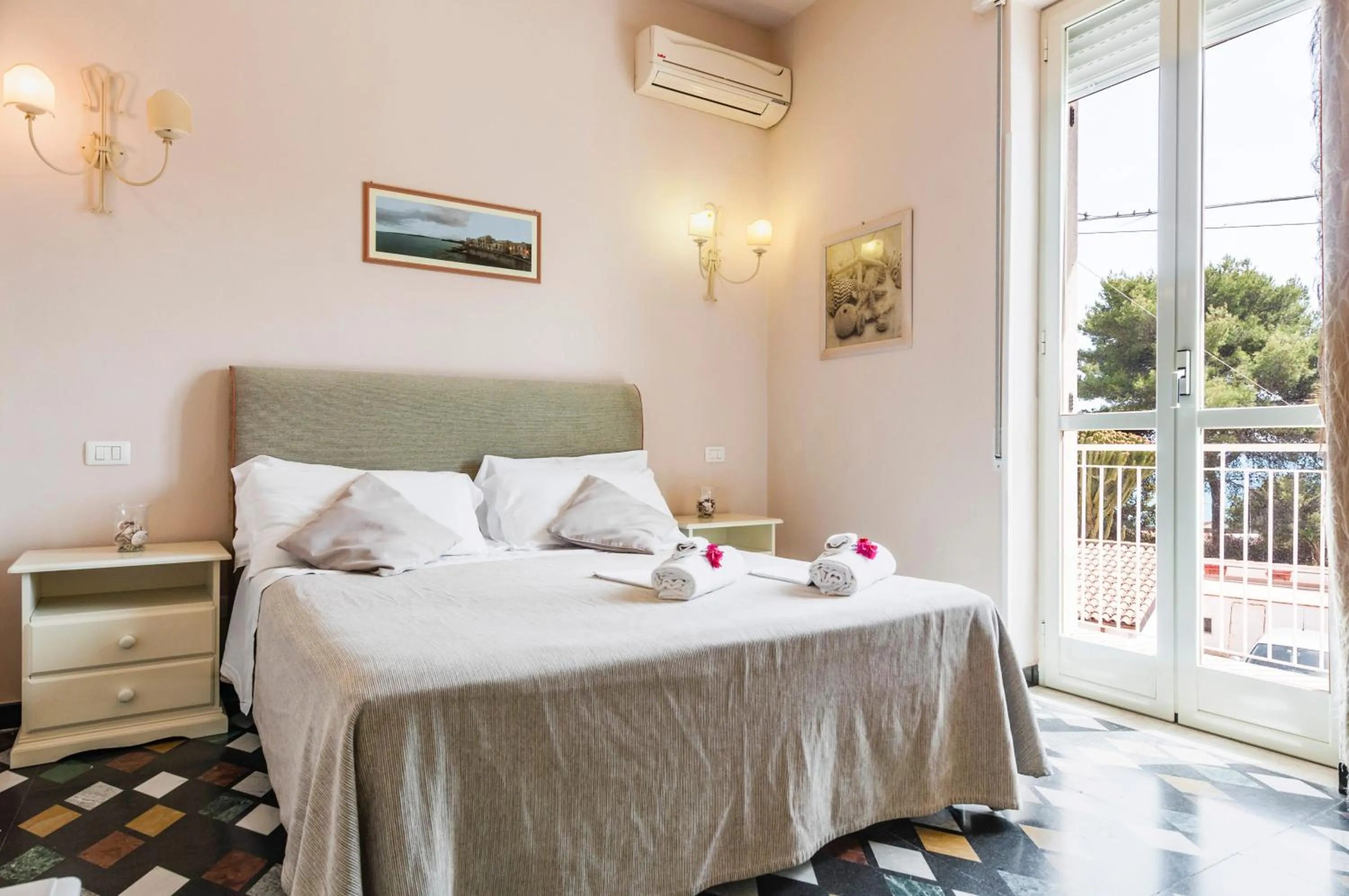 Bed in Stella del mare Apartments