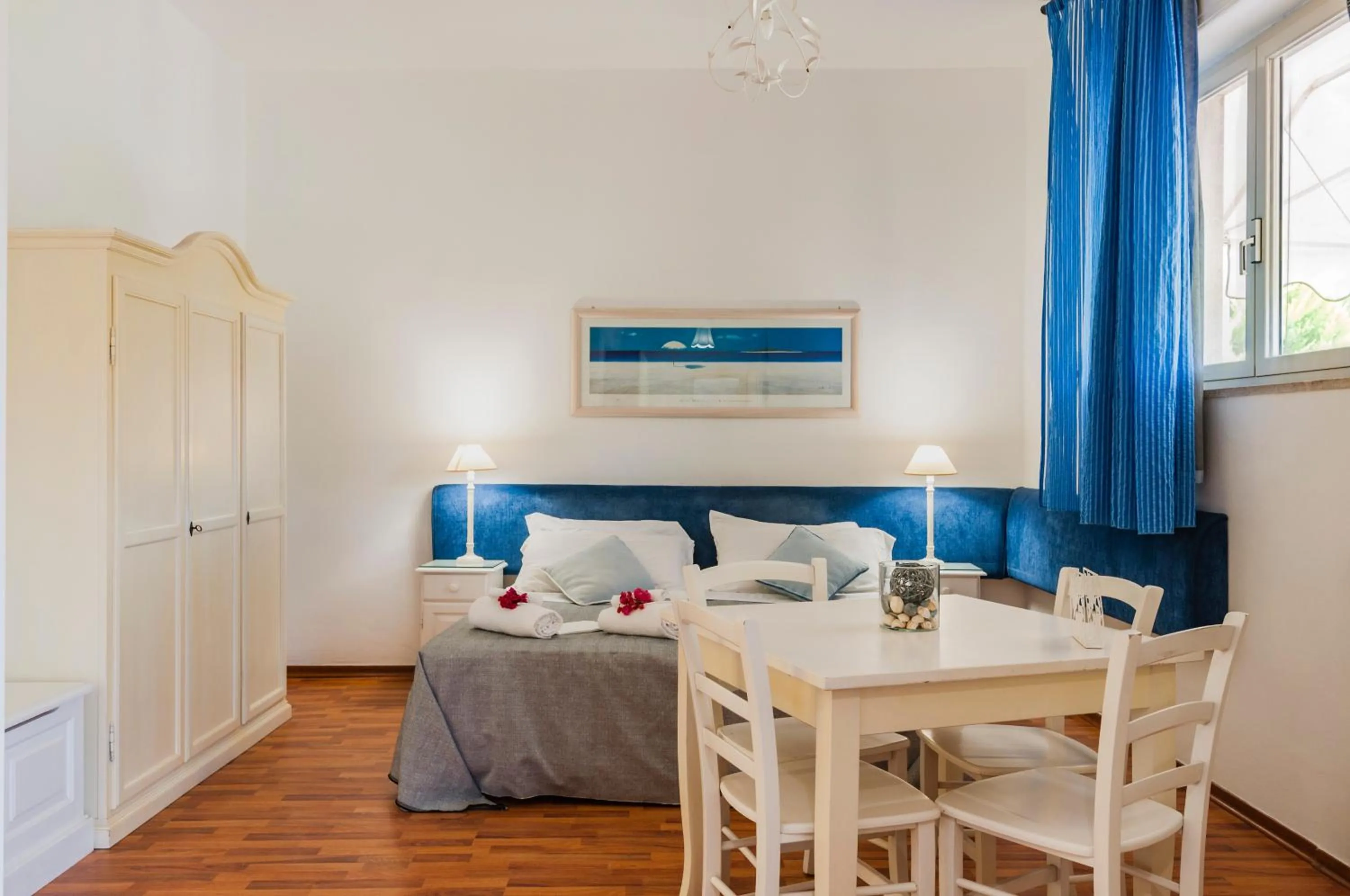 Bed in Stella del mare Apartments