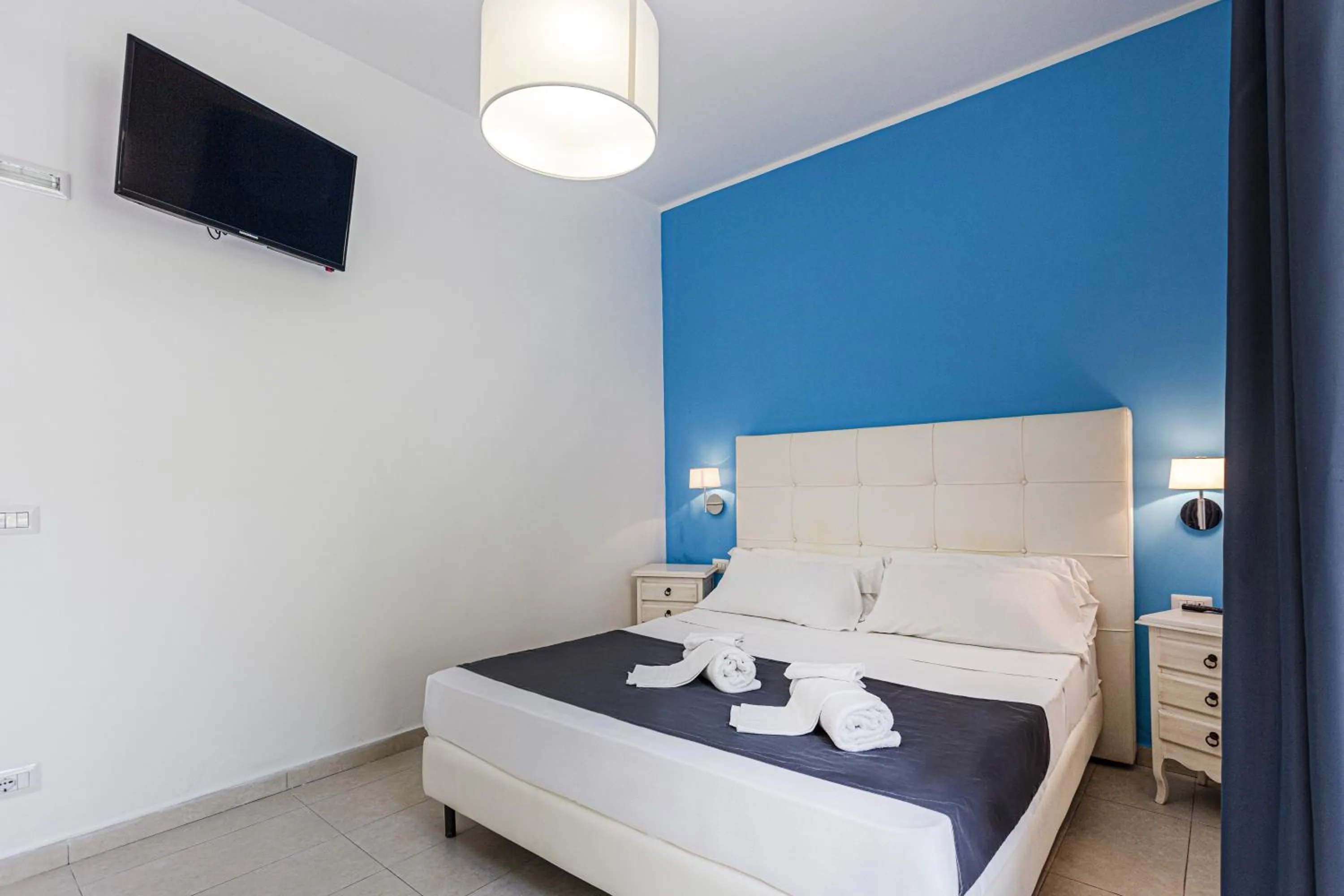 Bed in Stella del mare Apartments