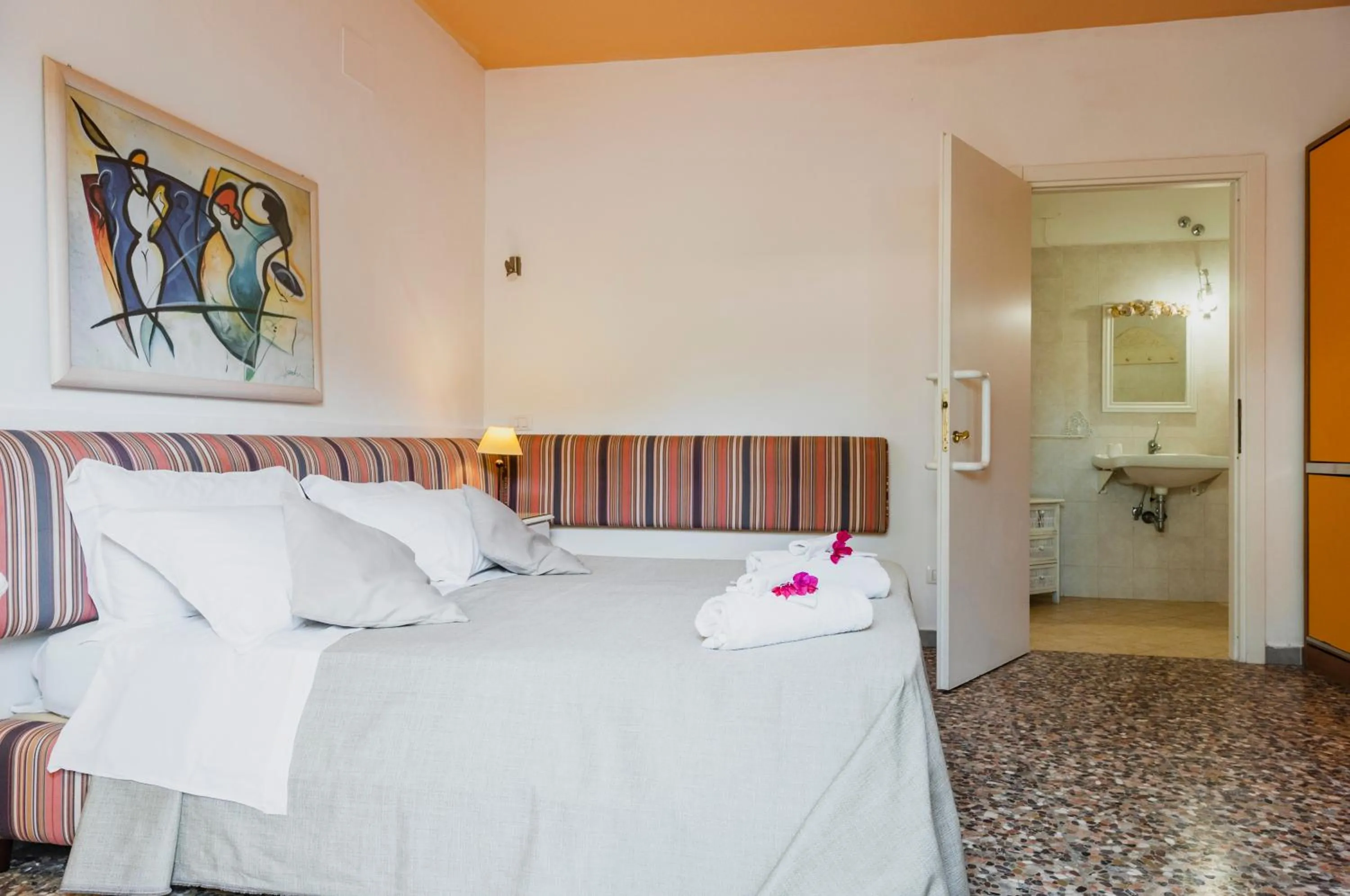 Bed in Stella del mare Apartments