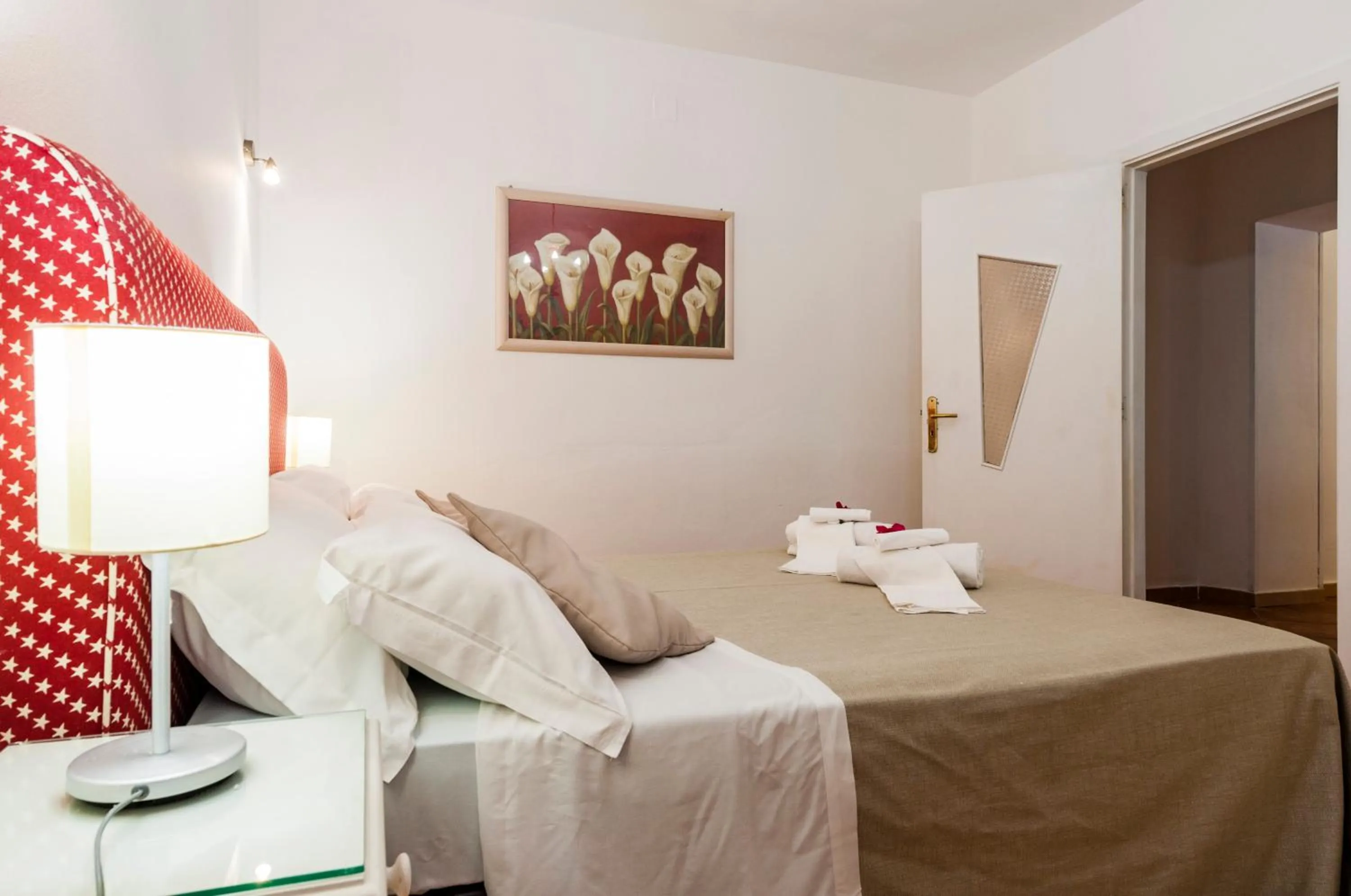 Bed in Stella del mare Apartments