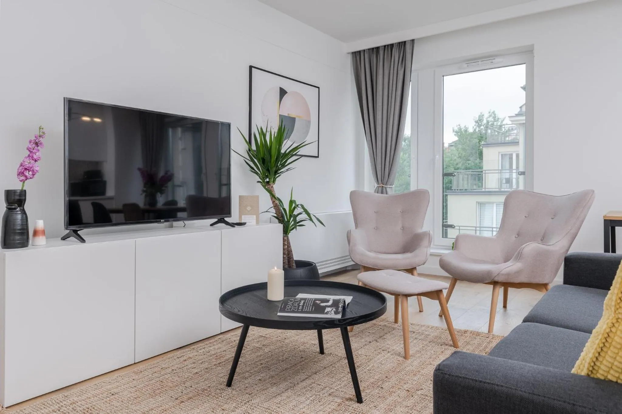 Living room in EXCLUSIVE Aparthotel Kraków Lubicz 40