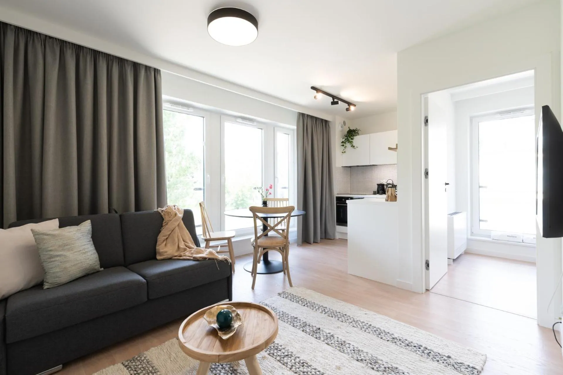 Living room in EXCLUSIVE Aparthotel Kraków Lubicz 40