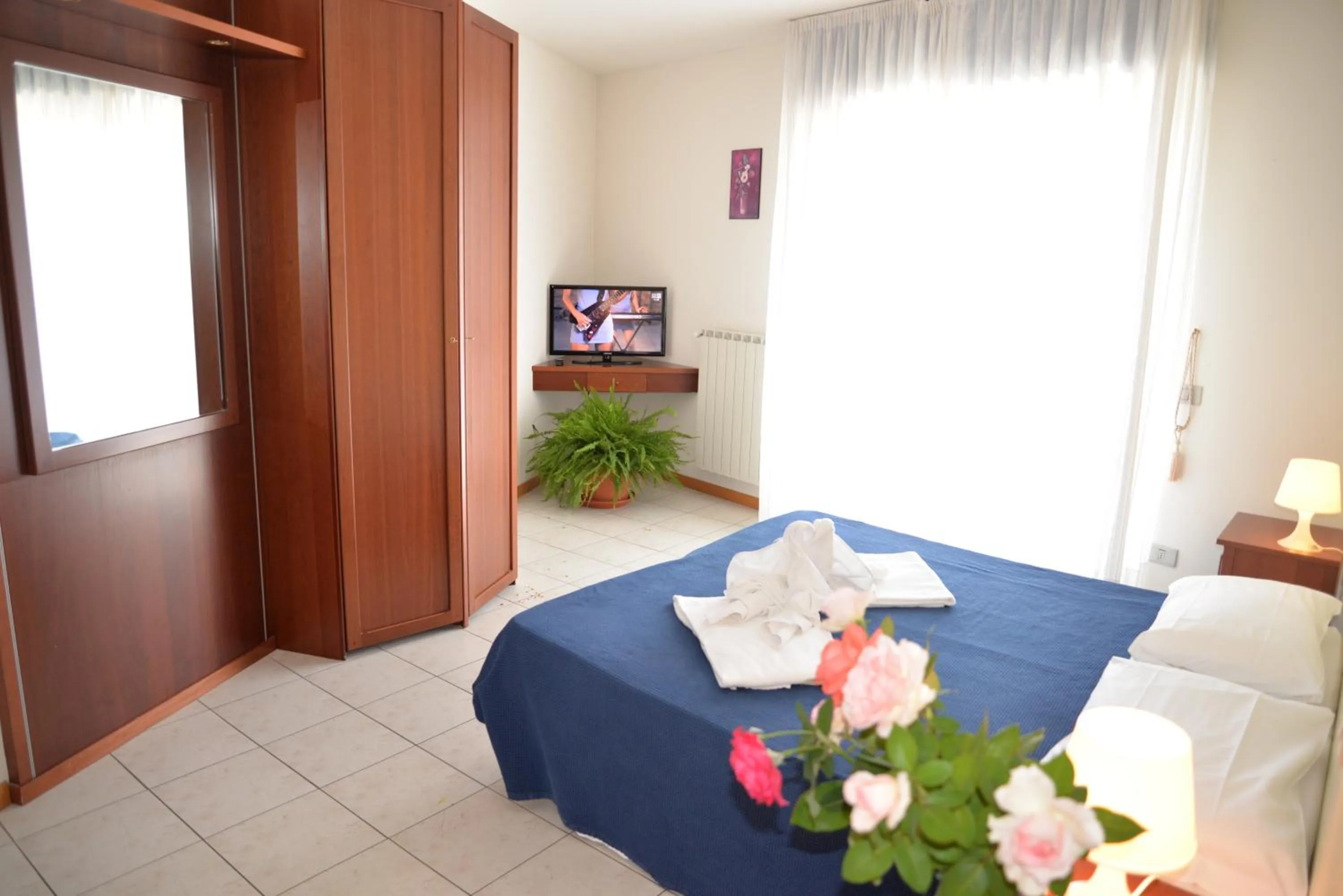 Photo of the whole room, Bed in Residence Le Corniole