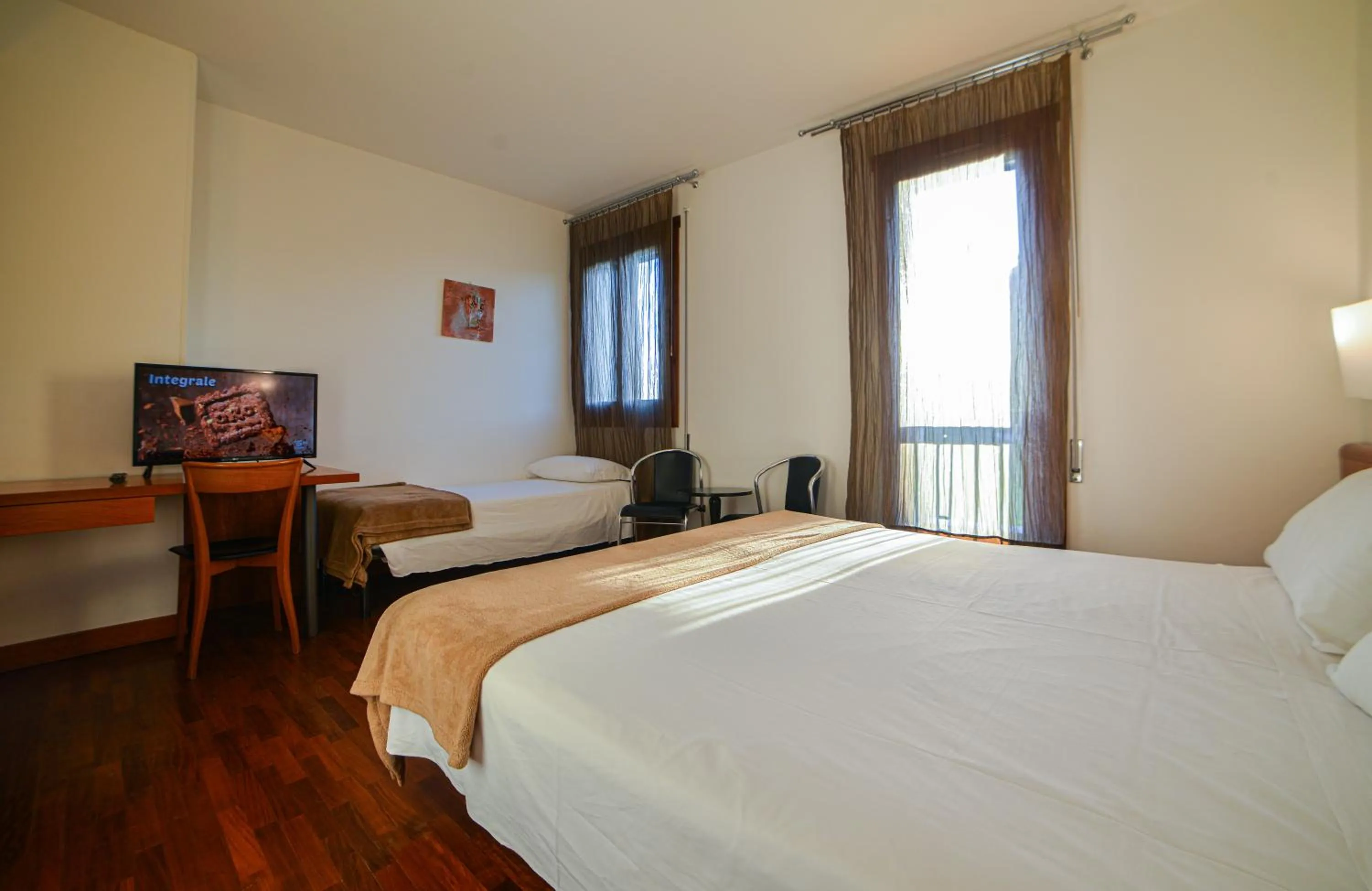 Photo of the whole room, Bed in HOTEL QUERINI Essential Business Hotel Sandrigo