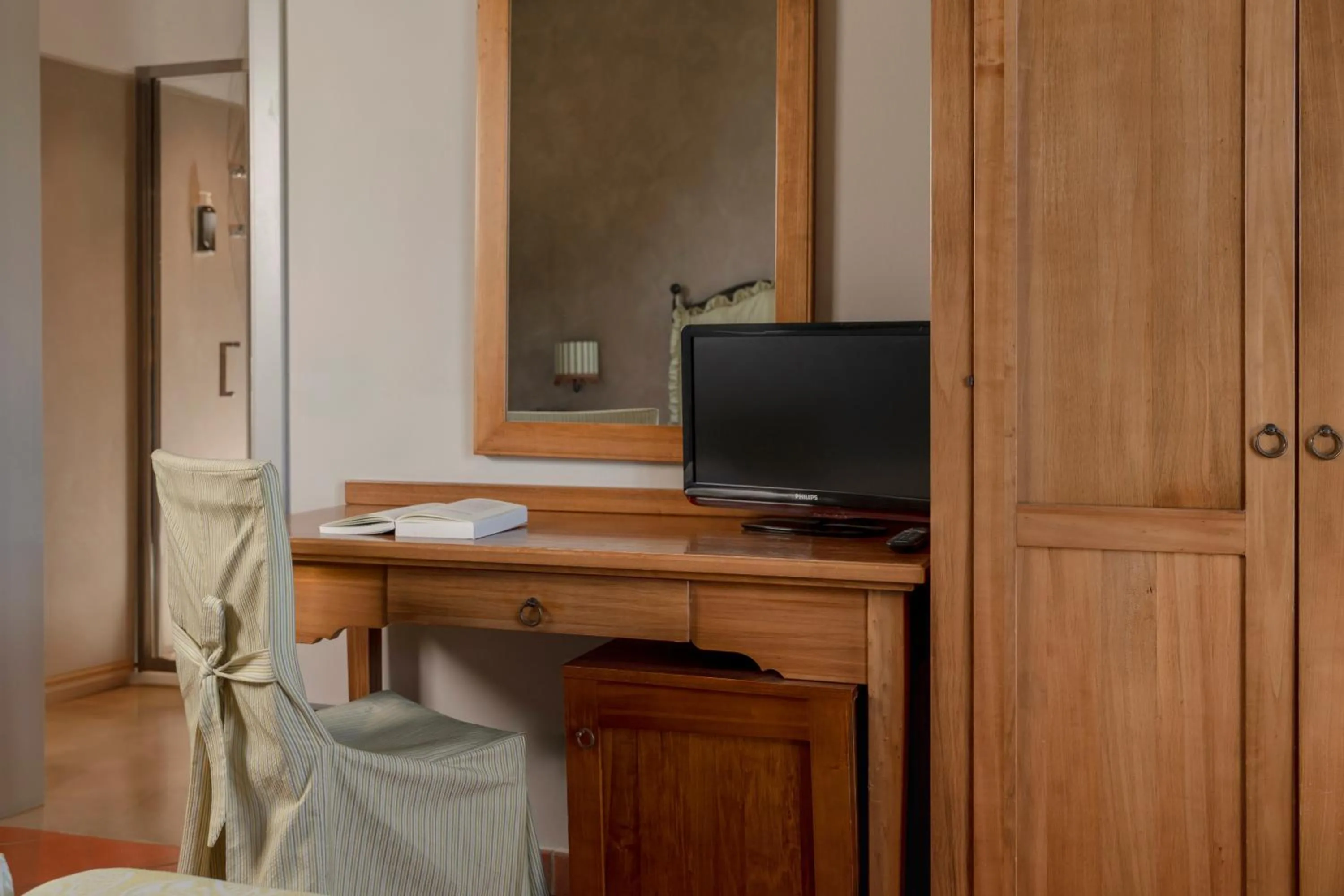 Photo of the whole room in Hotel & Restaurant Casolare Le Terre Rosse