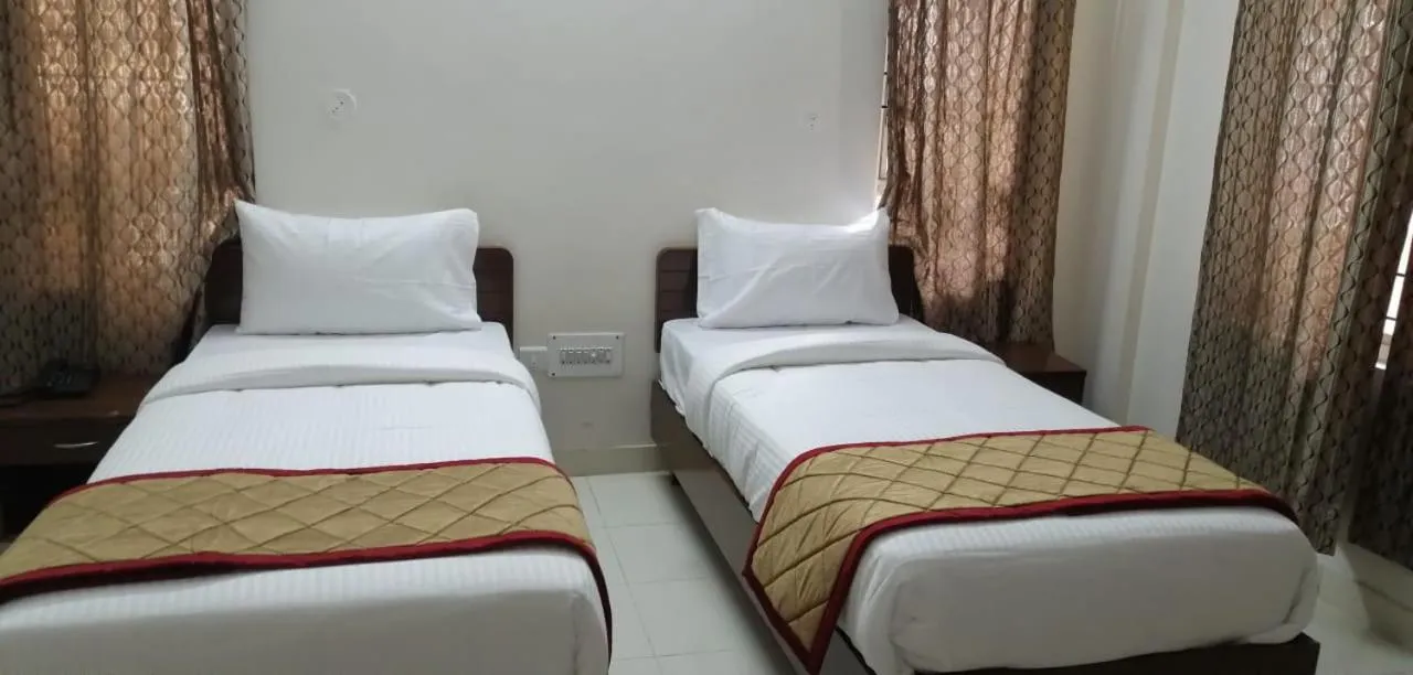 Bed in The Altruist Business Stays B-2