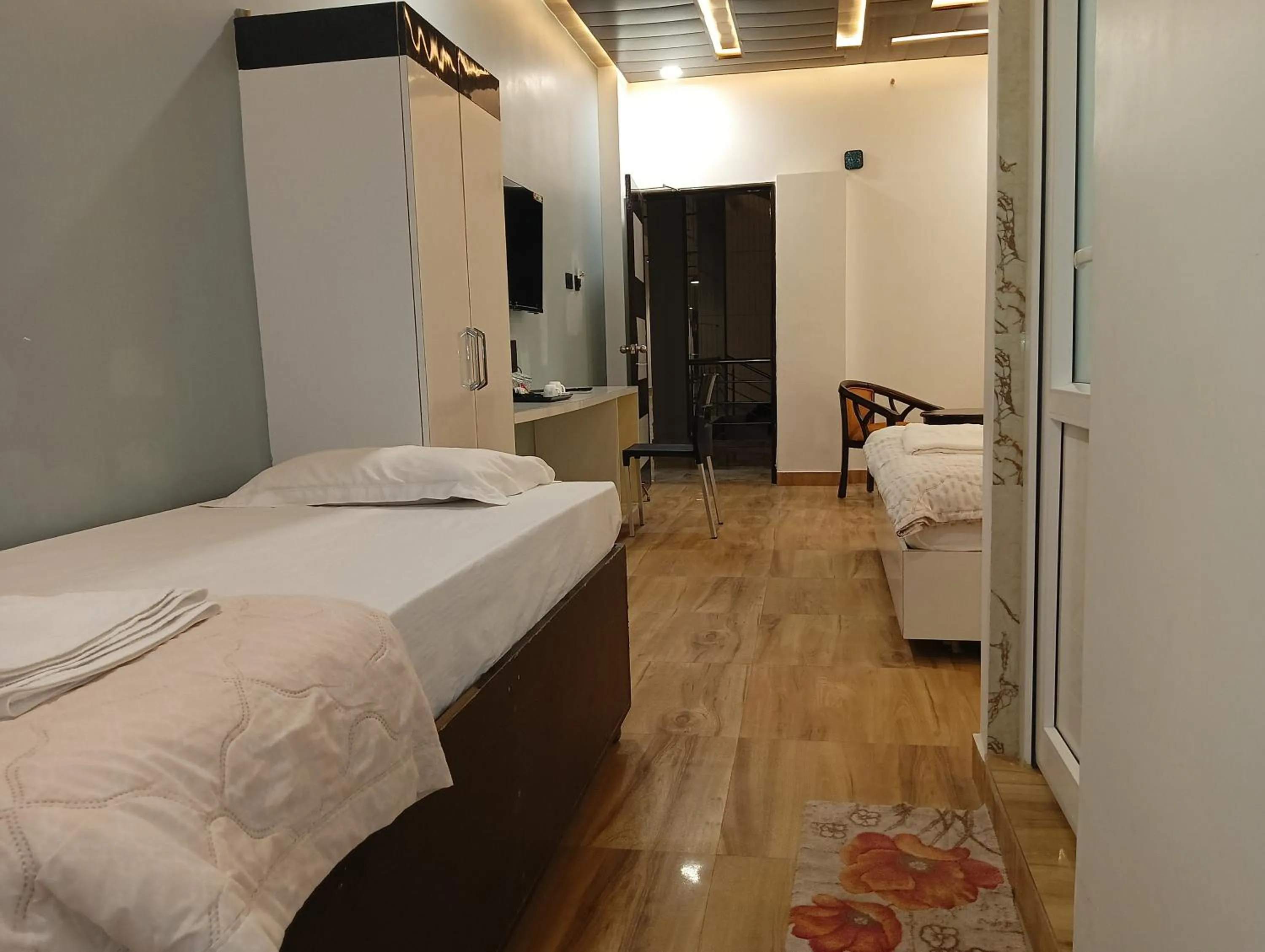 Photo of the whole room, Bed in Hotel Buddha Park near Sarnath, Varanasi