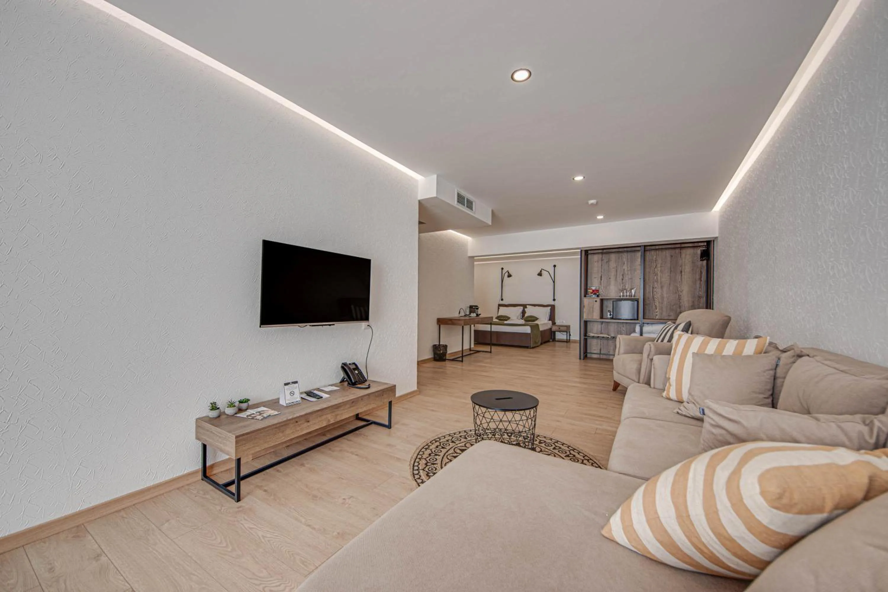 Communal lounge/ TV room in Olive Villas Beach Hotel