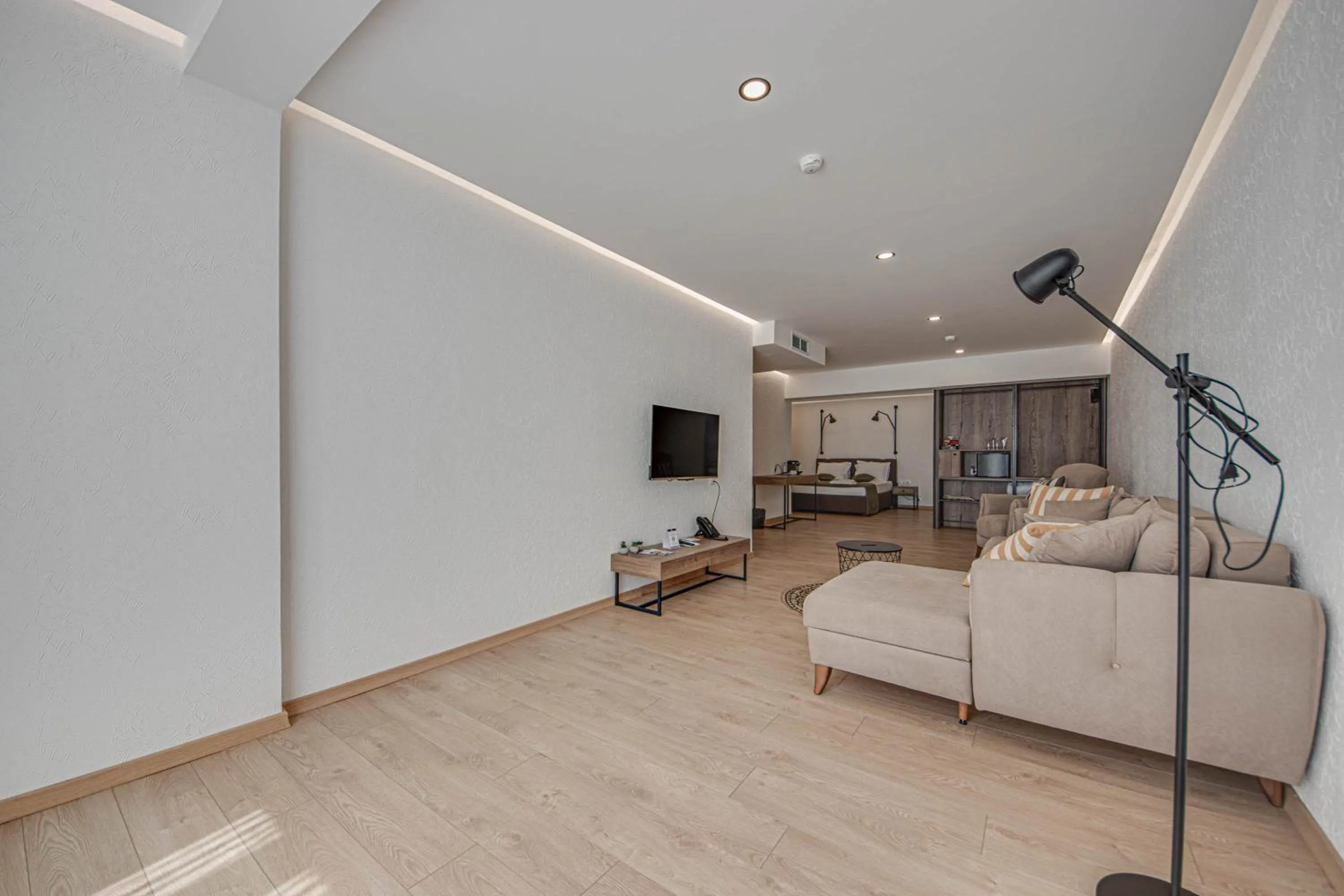 Communal lounge/ TV room in Olive Villas Beach Hotel