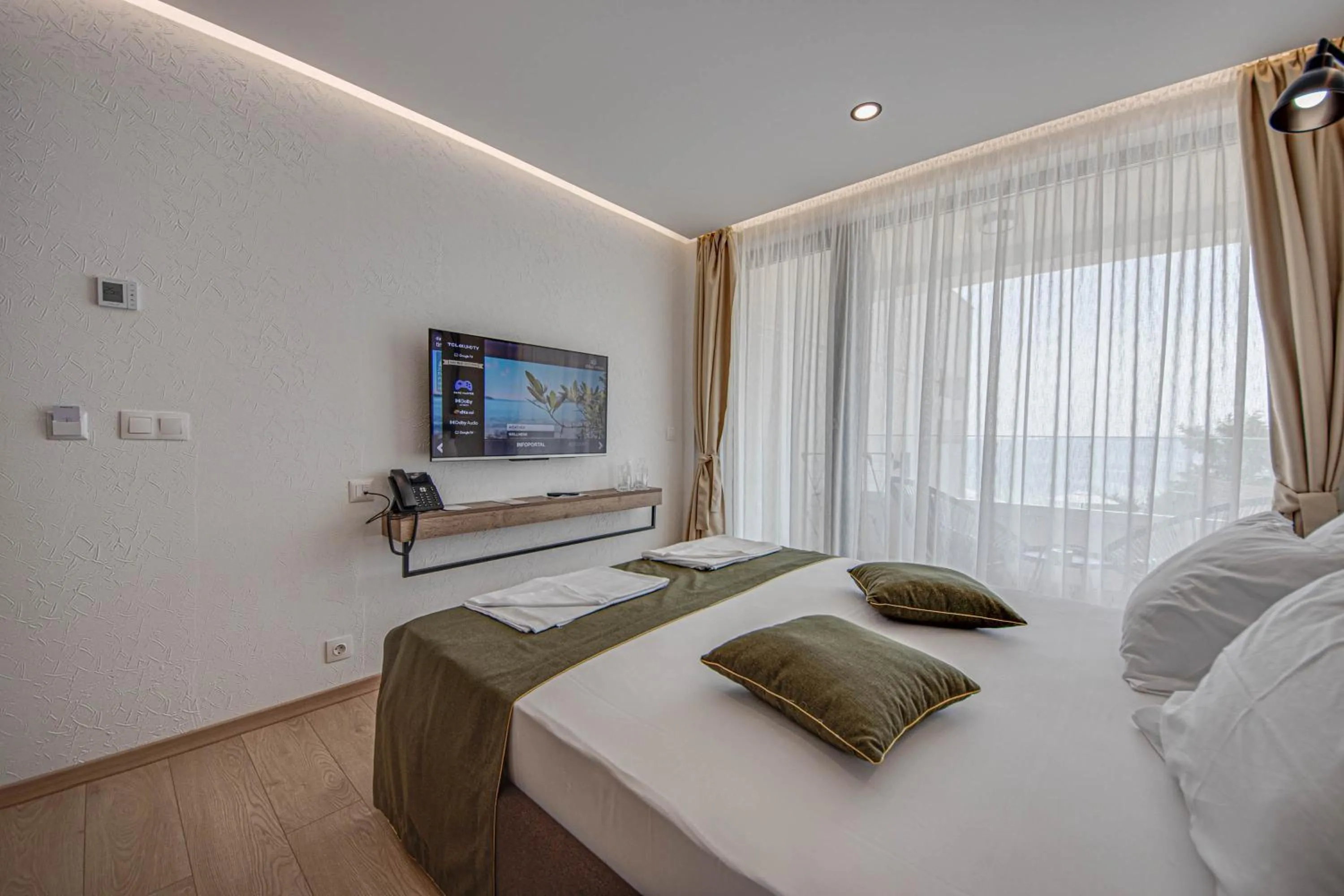 Bed in Olive Villas Beach Hotel