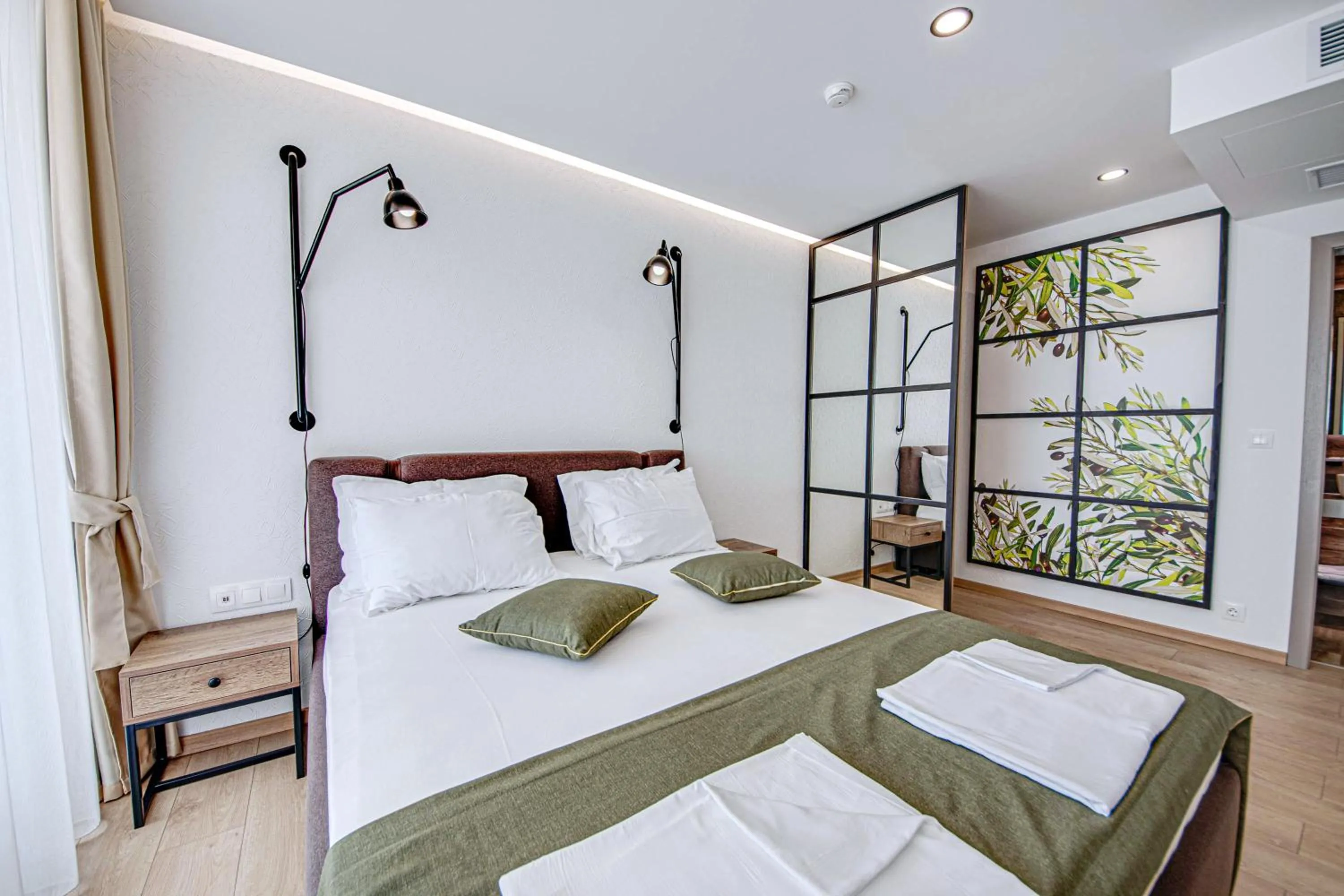 Bed in Olive Villas Beach Hotel