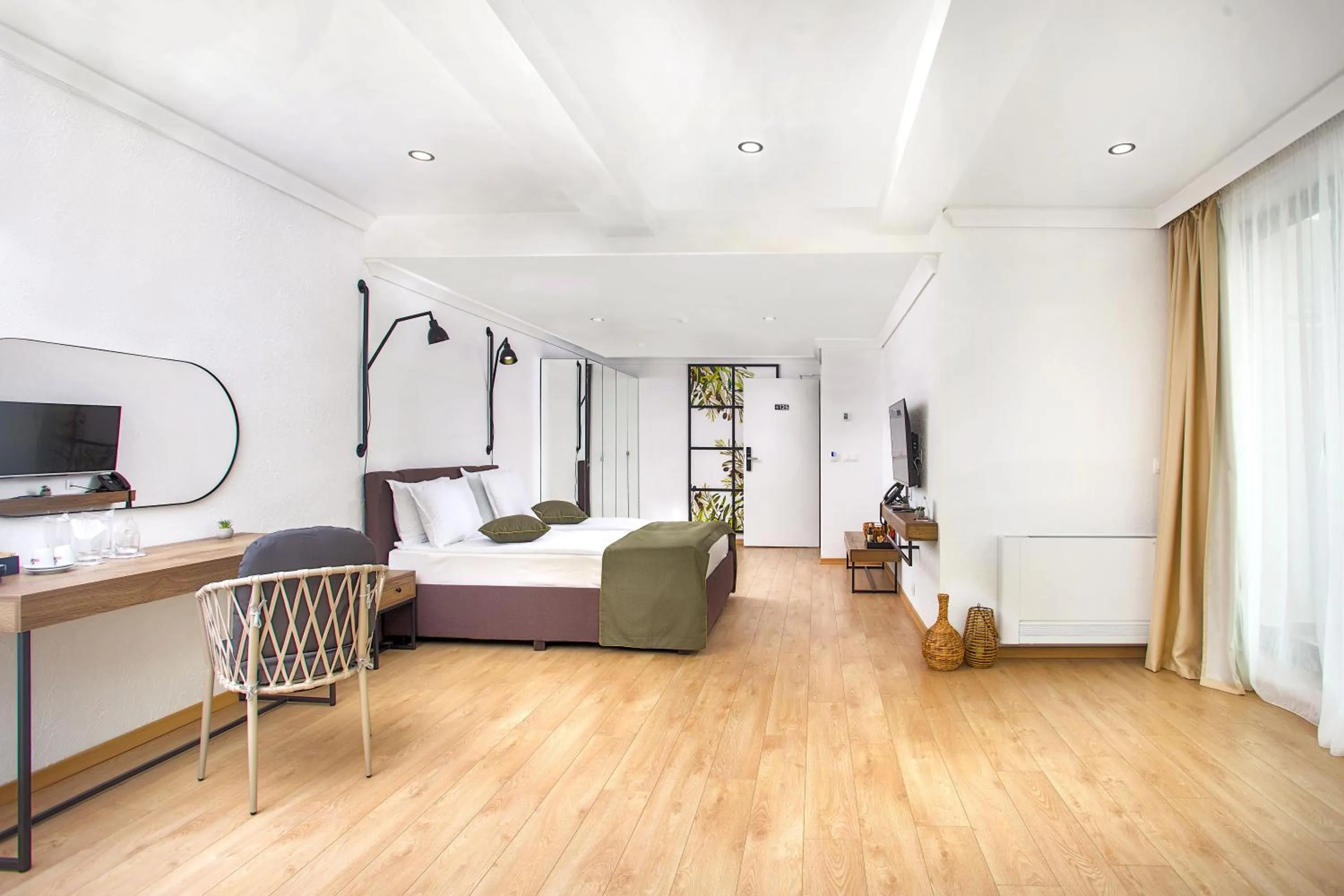 Bed in Olive Villas Beach Hotel