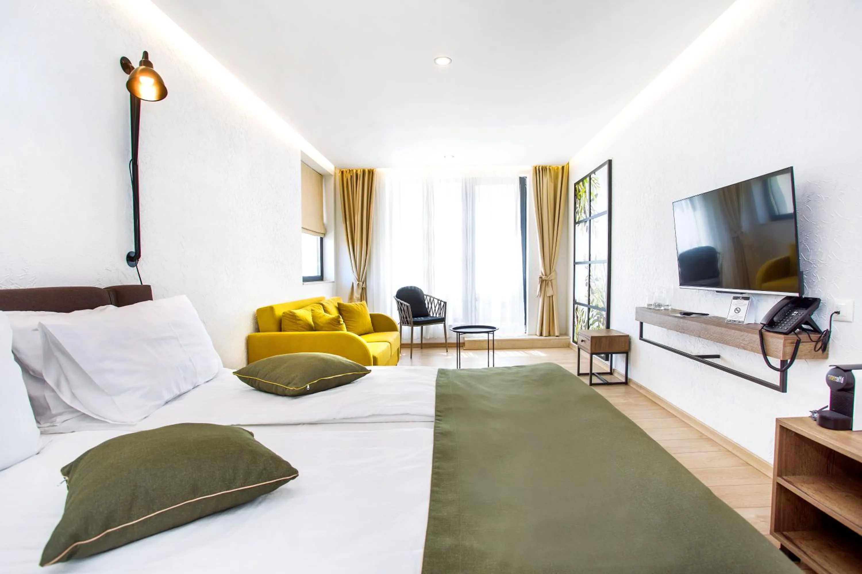 Bed in Olive Villas Beach Hotel