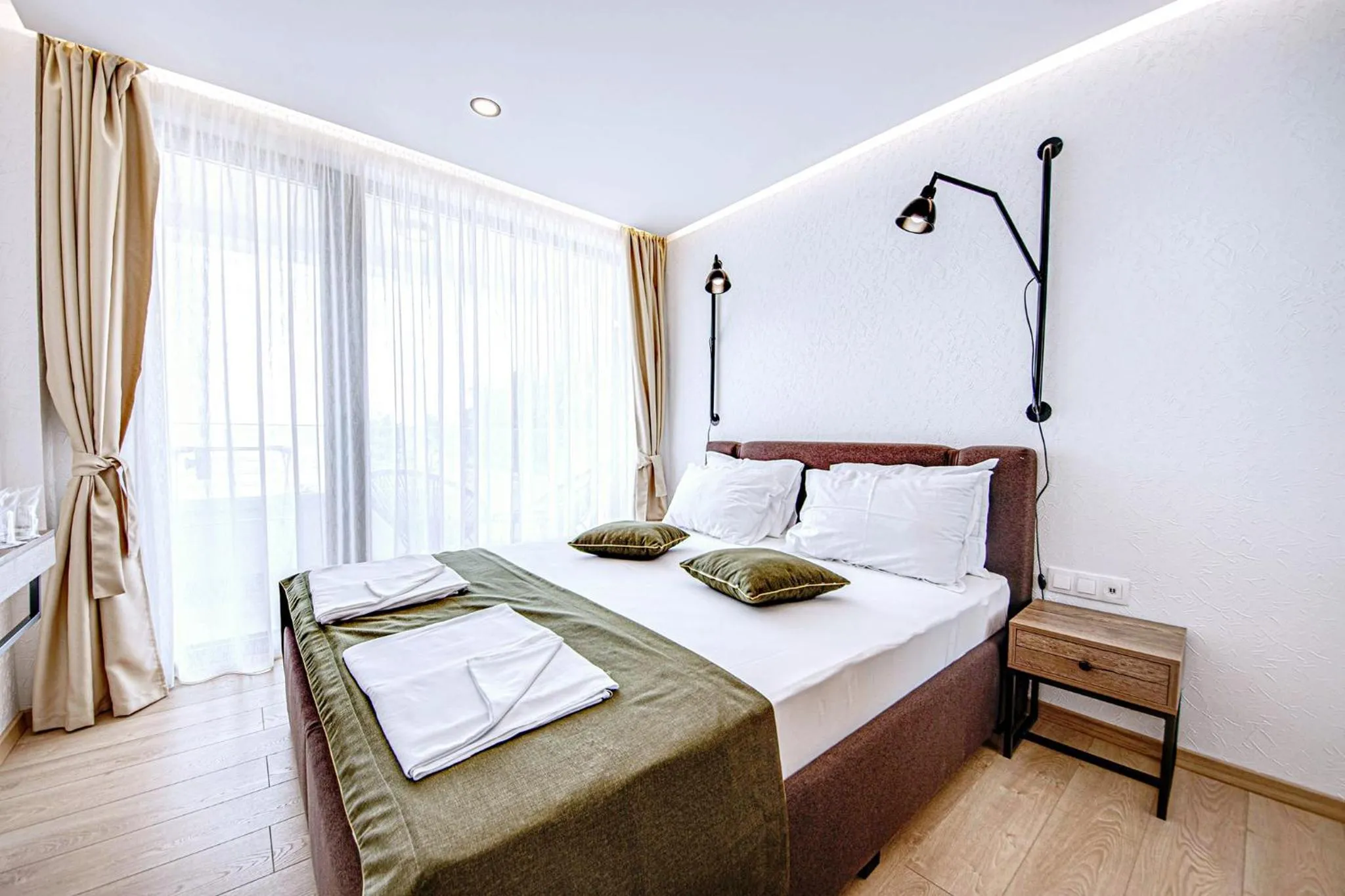 Bed in Olive Villas Beach Hotel