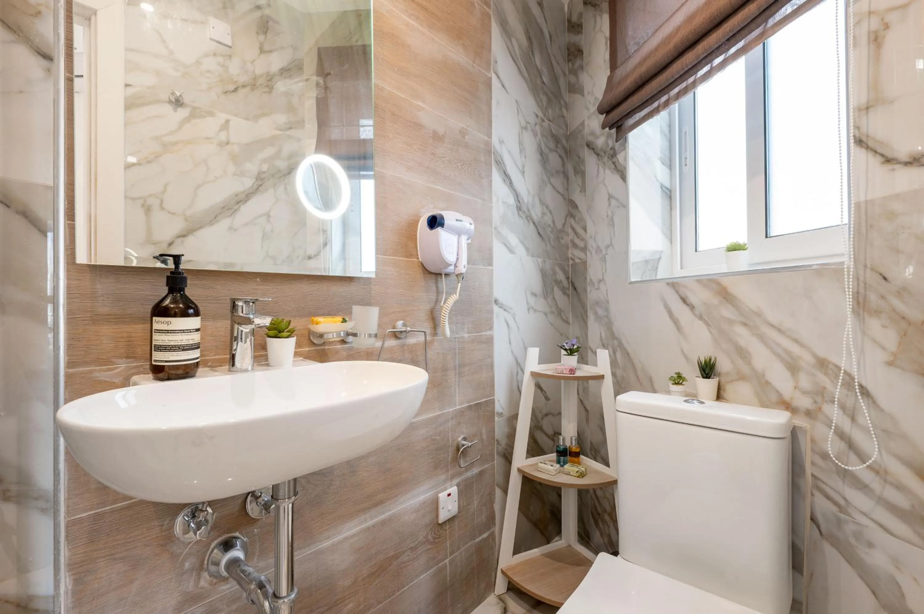 Bathroom in Vela Blu Boutique Suites