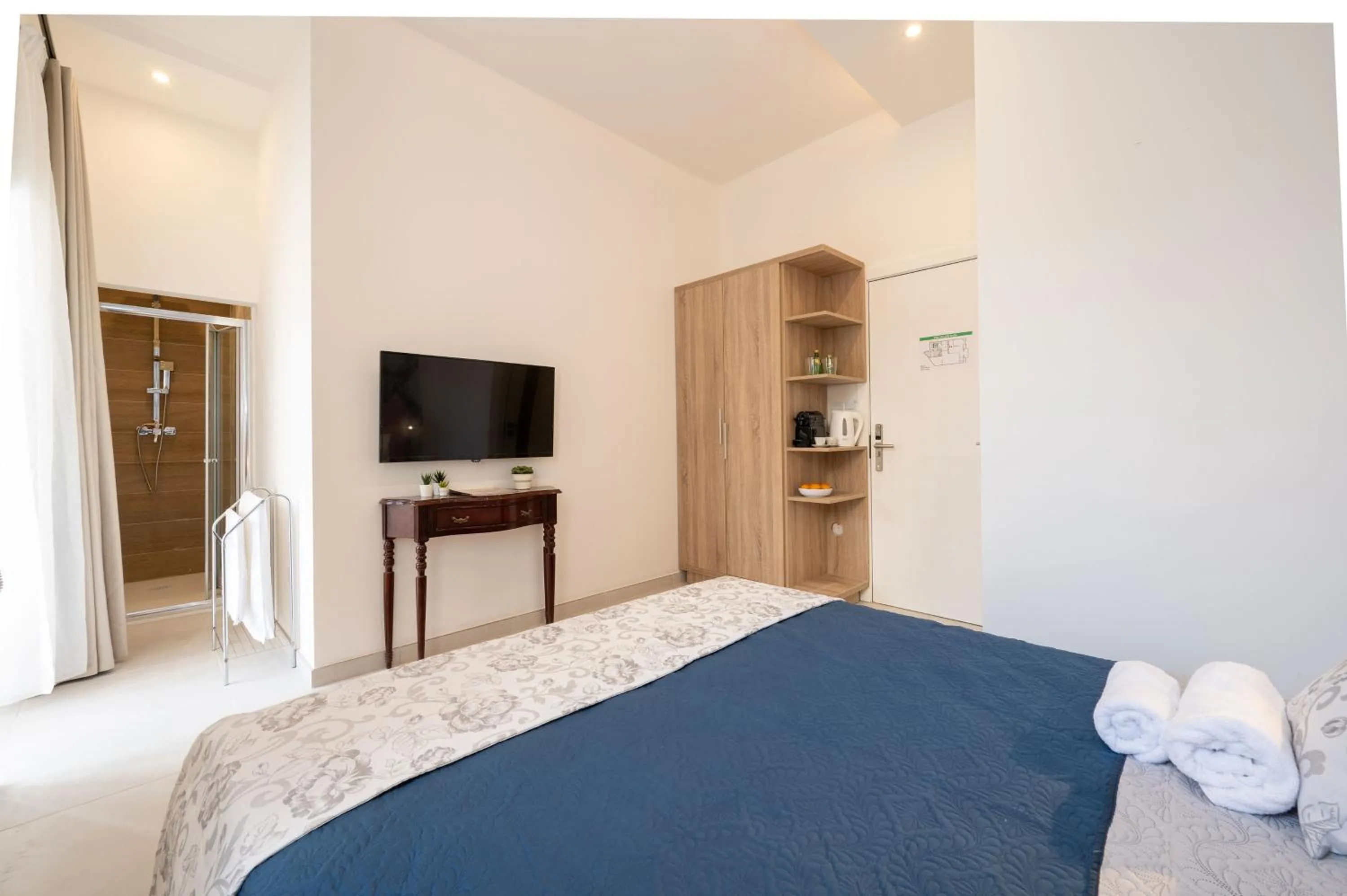 Photo of the whole room, Bed in Vela Blu Boutique Suites