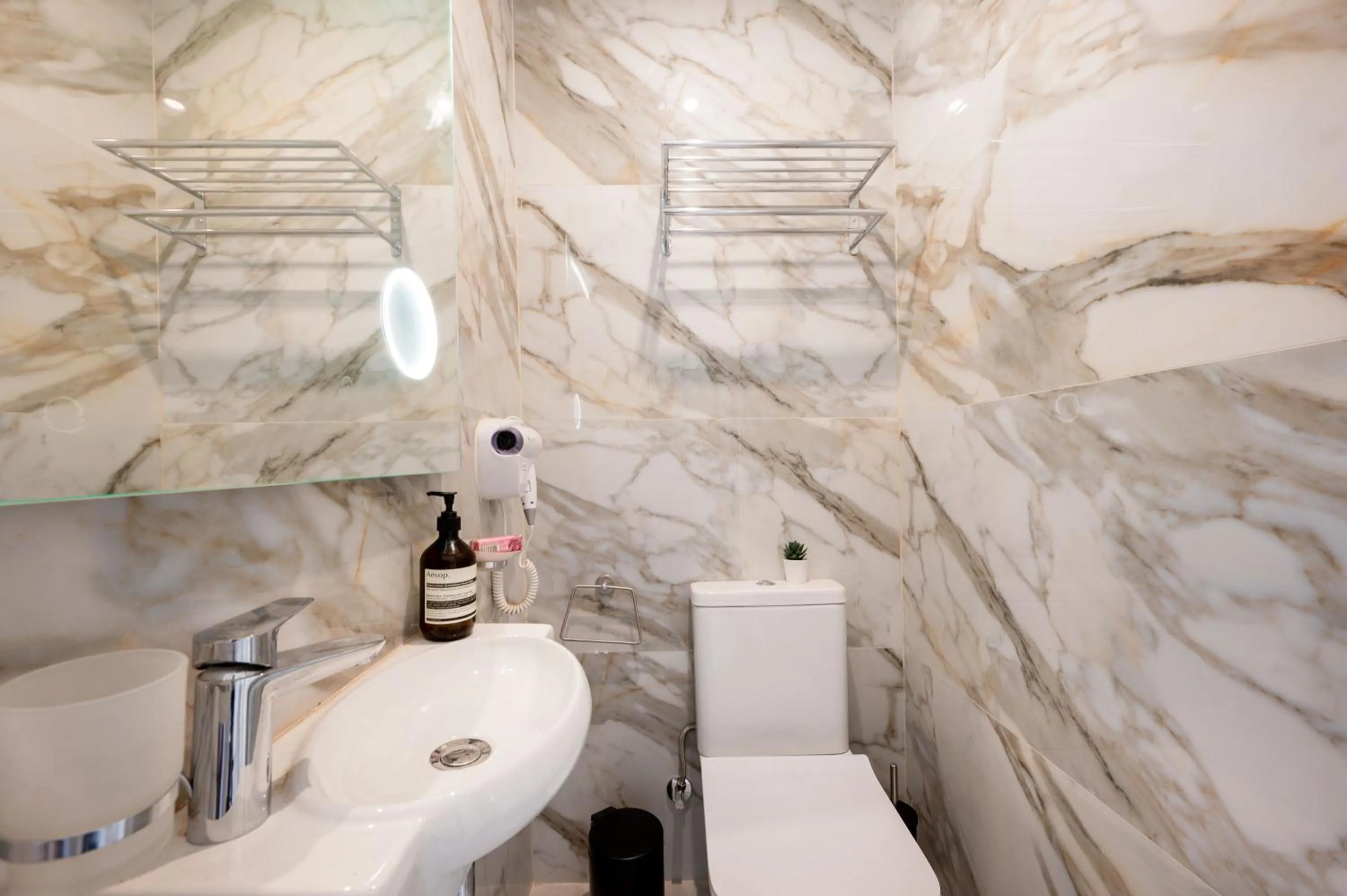 Bathroom in Vela Blu Boutique Suites