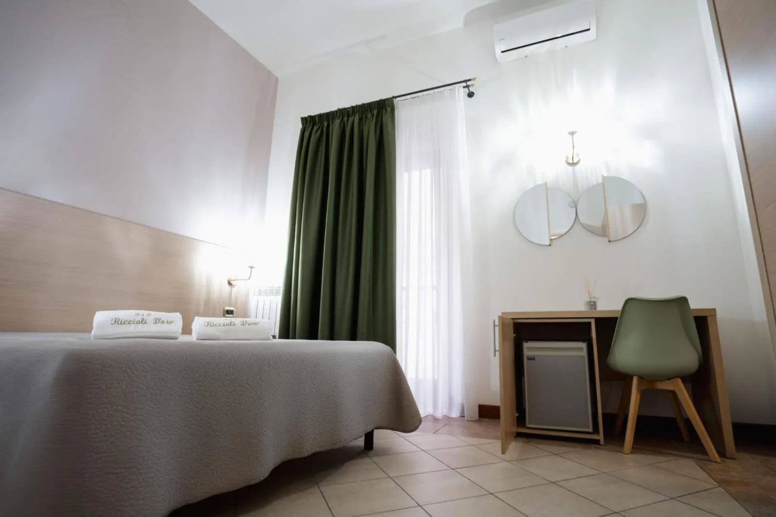 Bed in B&B Riccioli D'oro