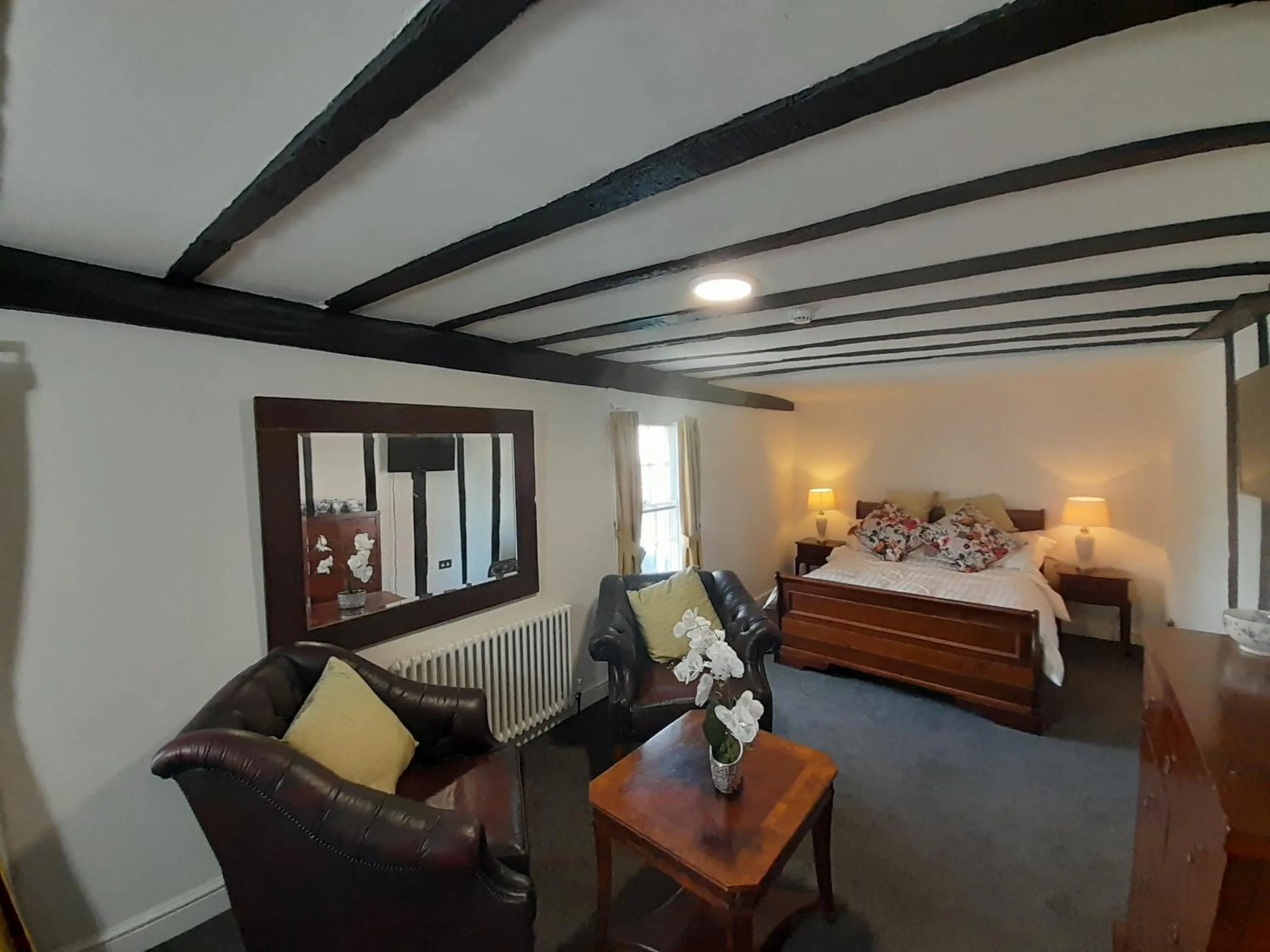 Photo of the whole room, Bed in Stone Court House