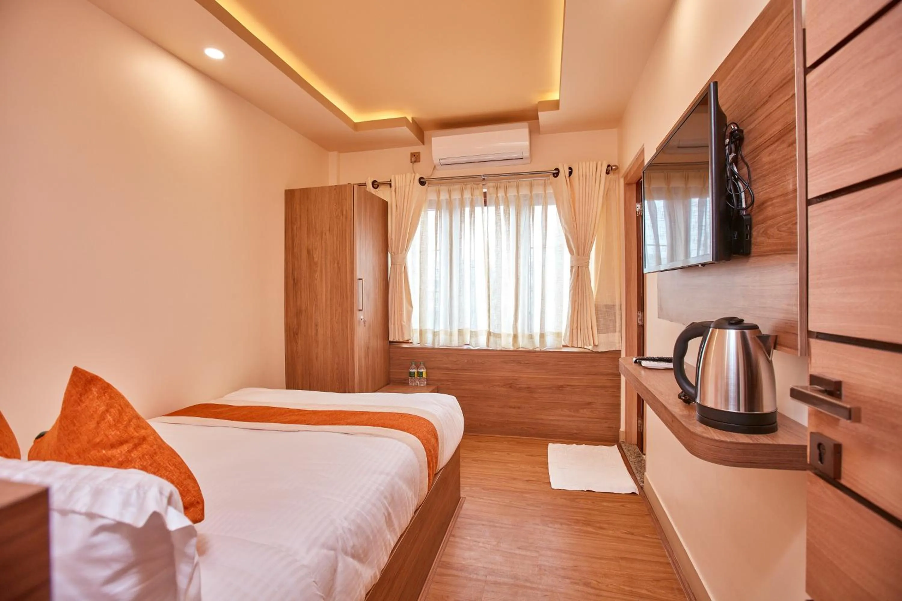 Bed in The Samrat Palace - Luxury Hotel in Kathmandu